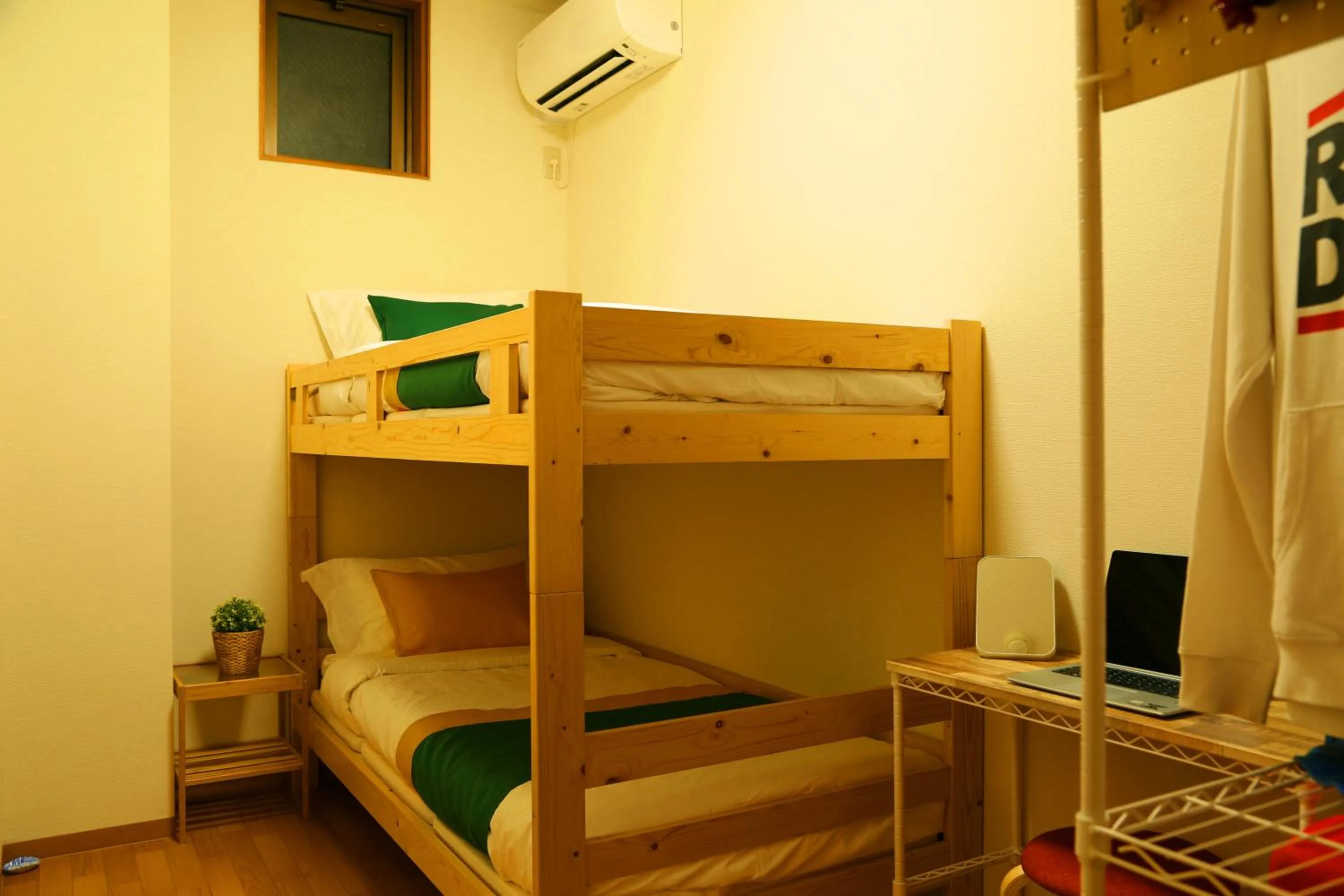 Bed in E JOY INN-West Shinjuku Branch