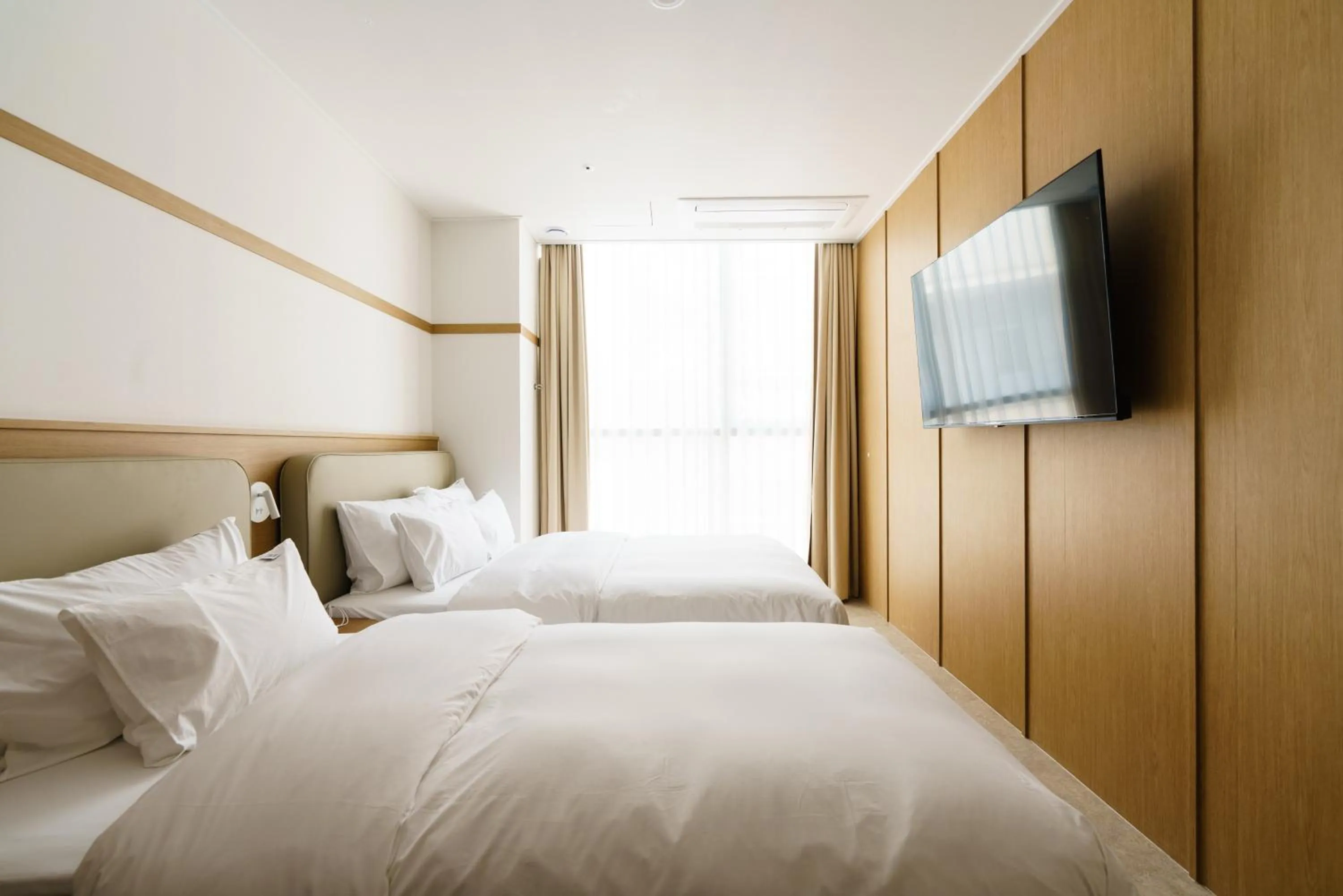 Bed in Yangju Hotel Ippda