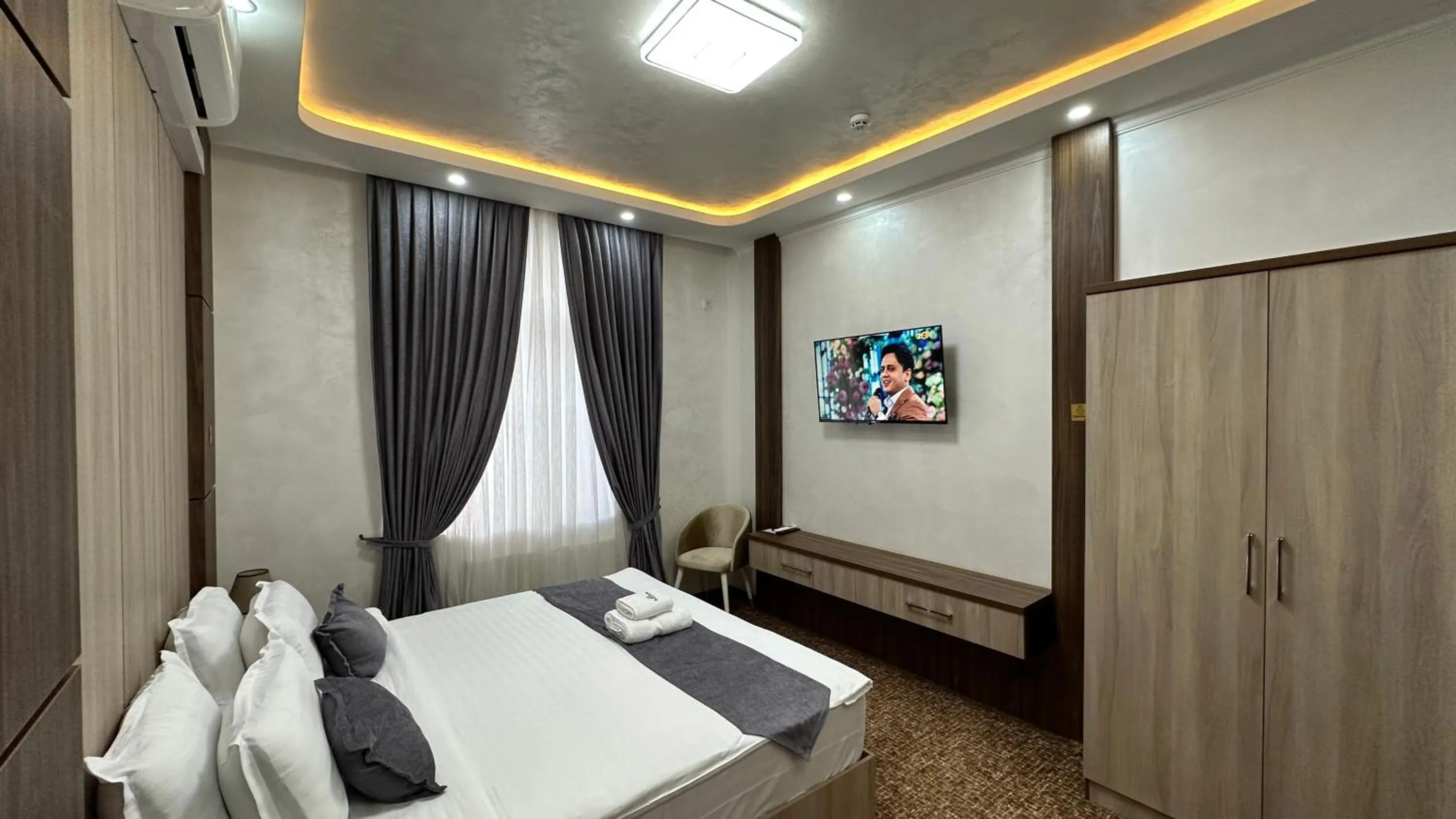 Communal lounge/ TV room, Bed in Rayyan Hotel & SPA Tashkent
