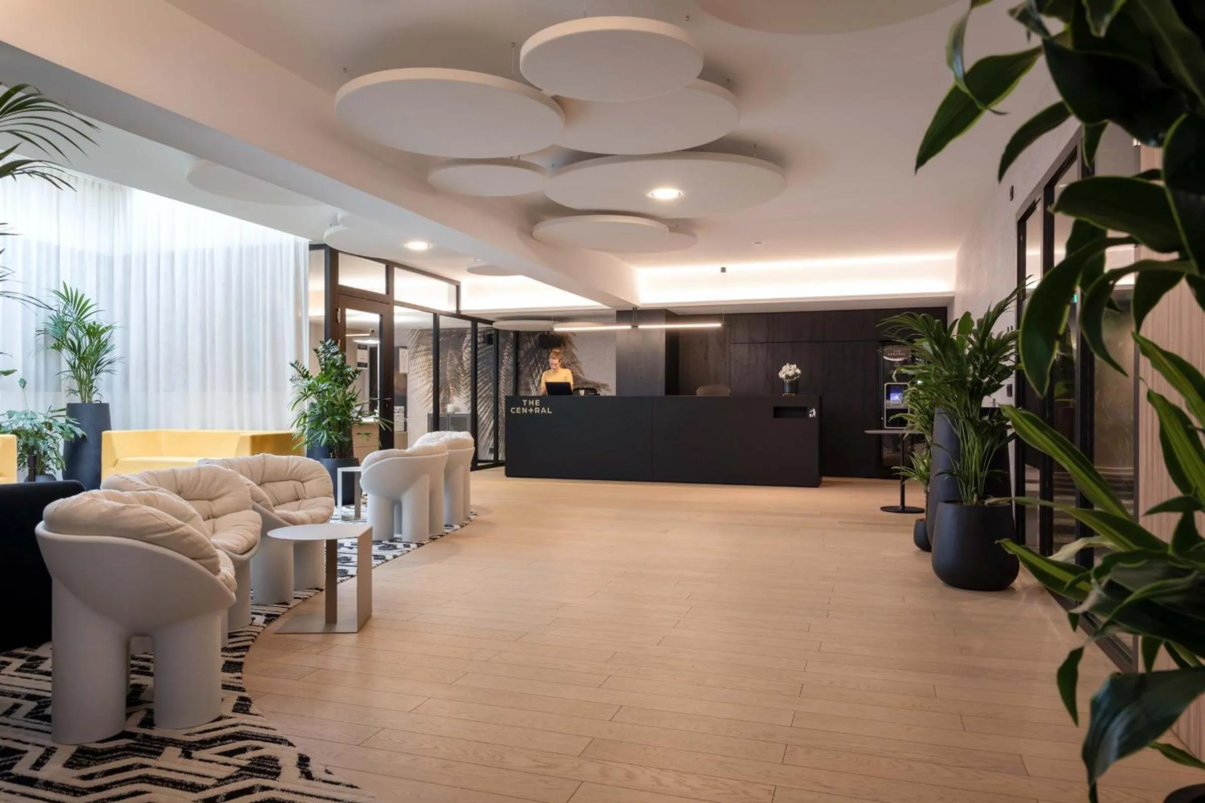 Communal lounge/ TV room in The Central Kirchberg - Smart ApartHotel