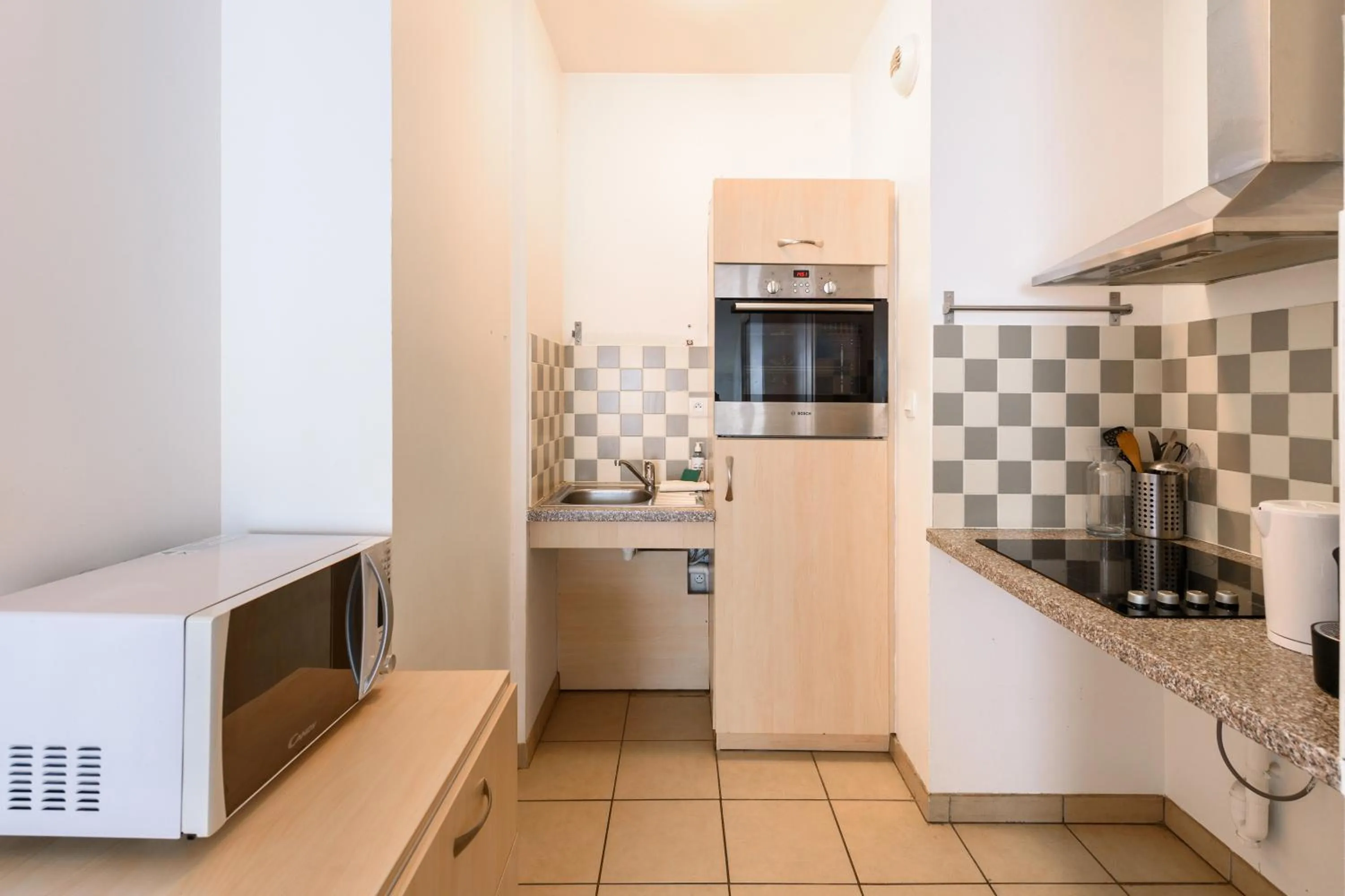 Kitchen or kitchenette in Residhotel Toulouse Centre