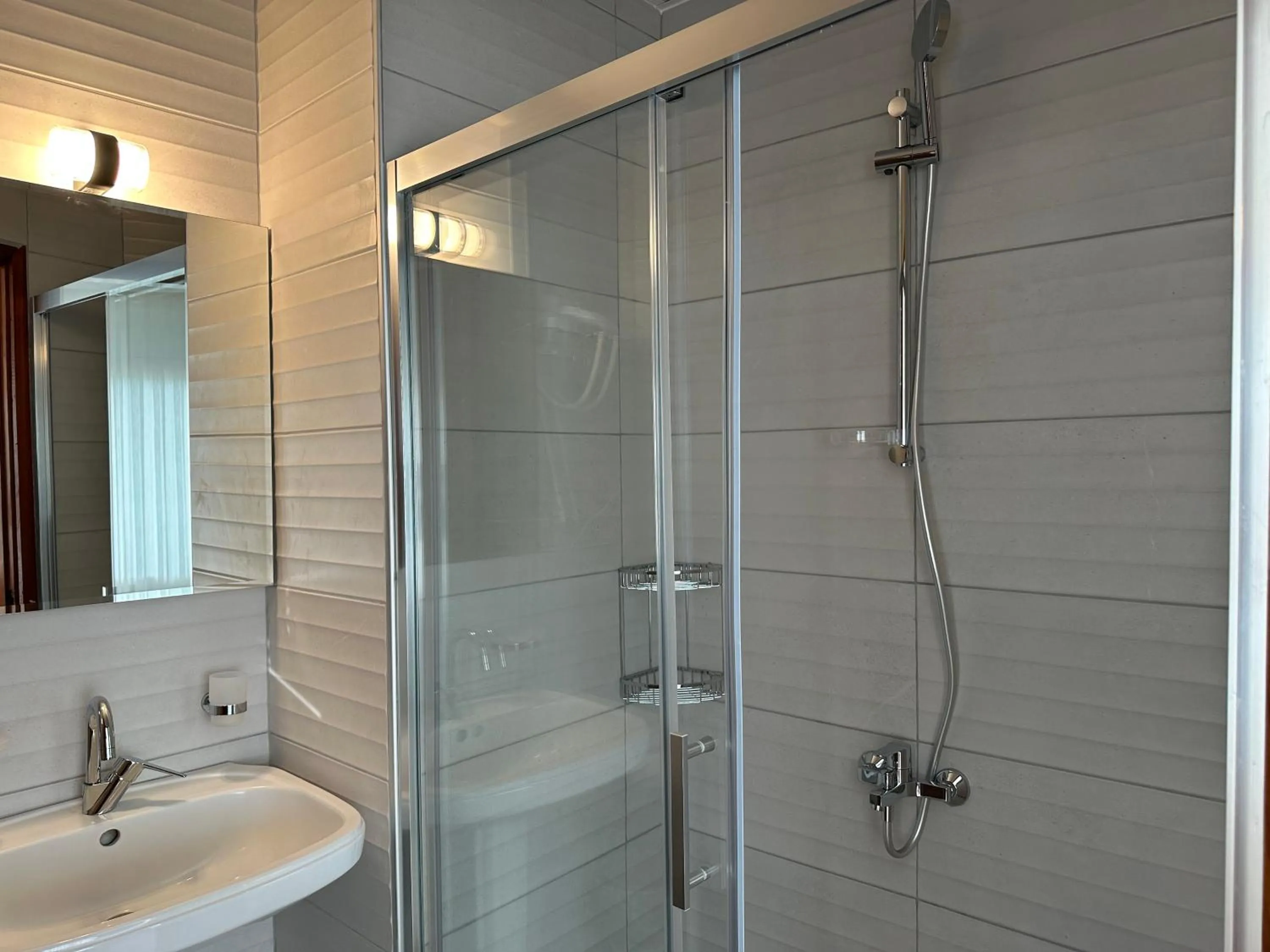 Shower in NATURELLA APART HOTEL