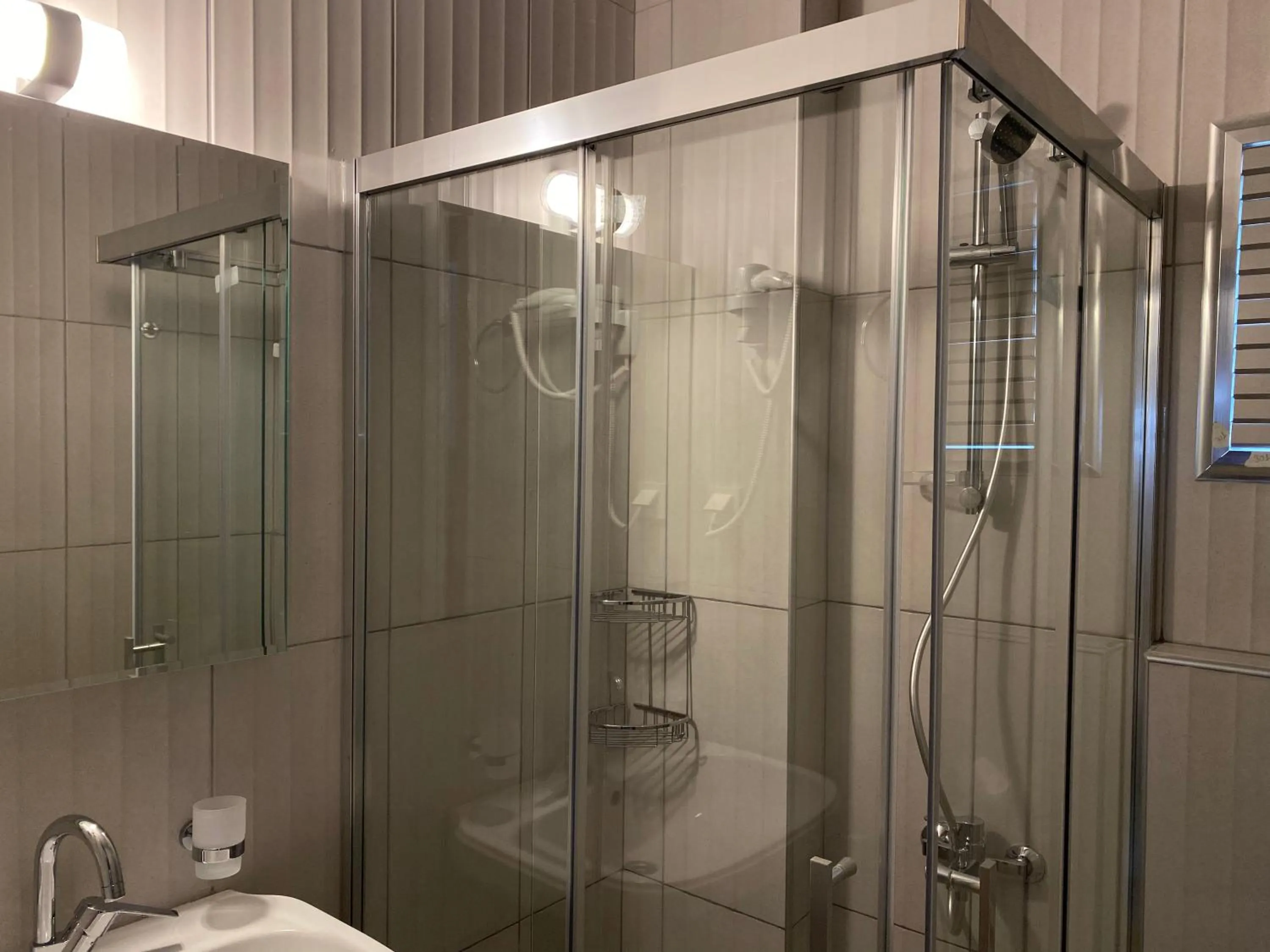 Shower in NATURELLA APART HOTEL