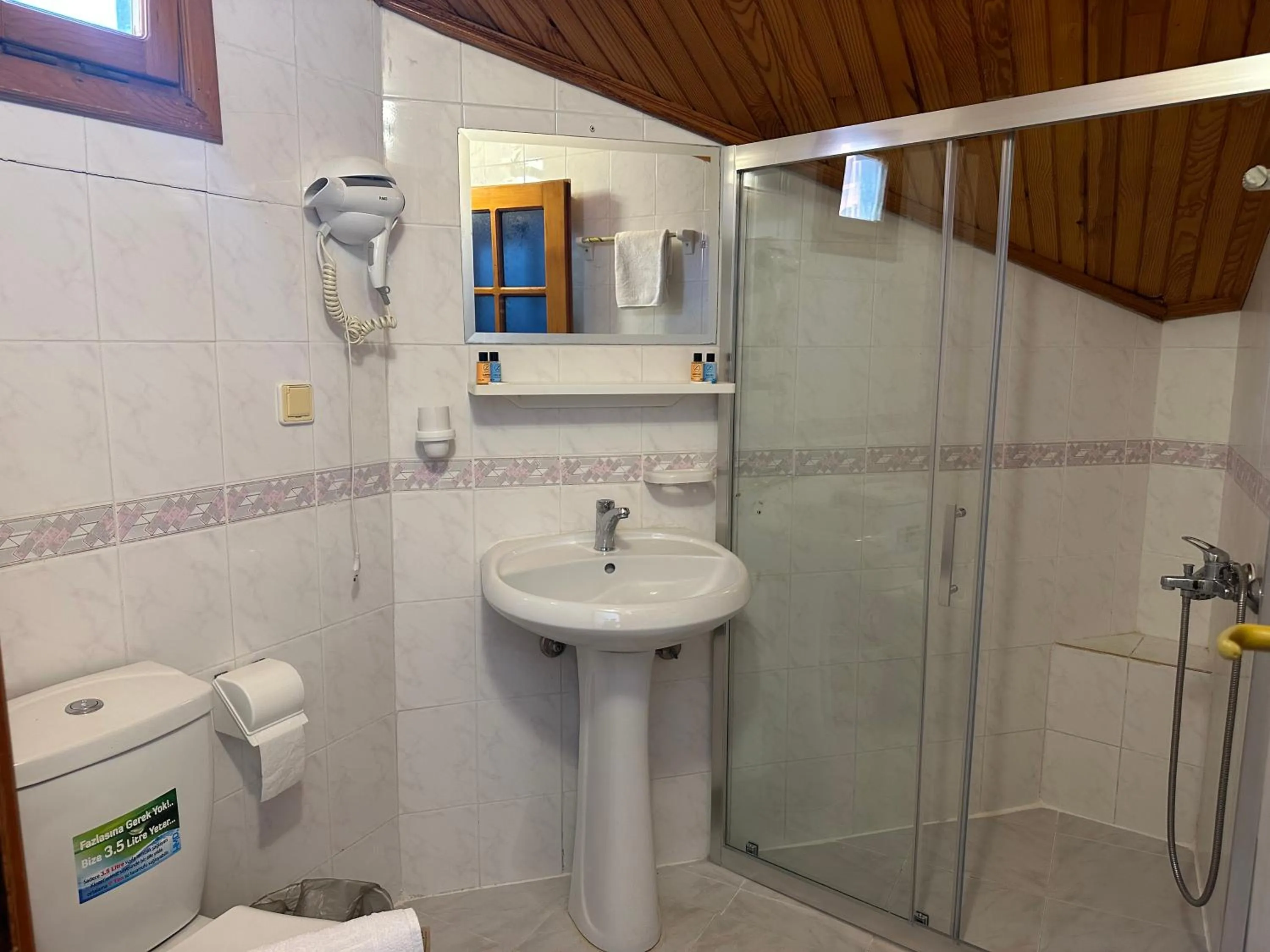 Shower in NATURELLA APART HOTEL