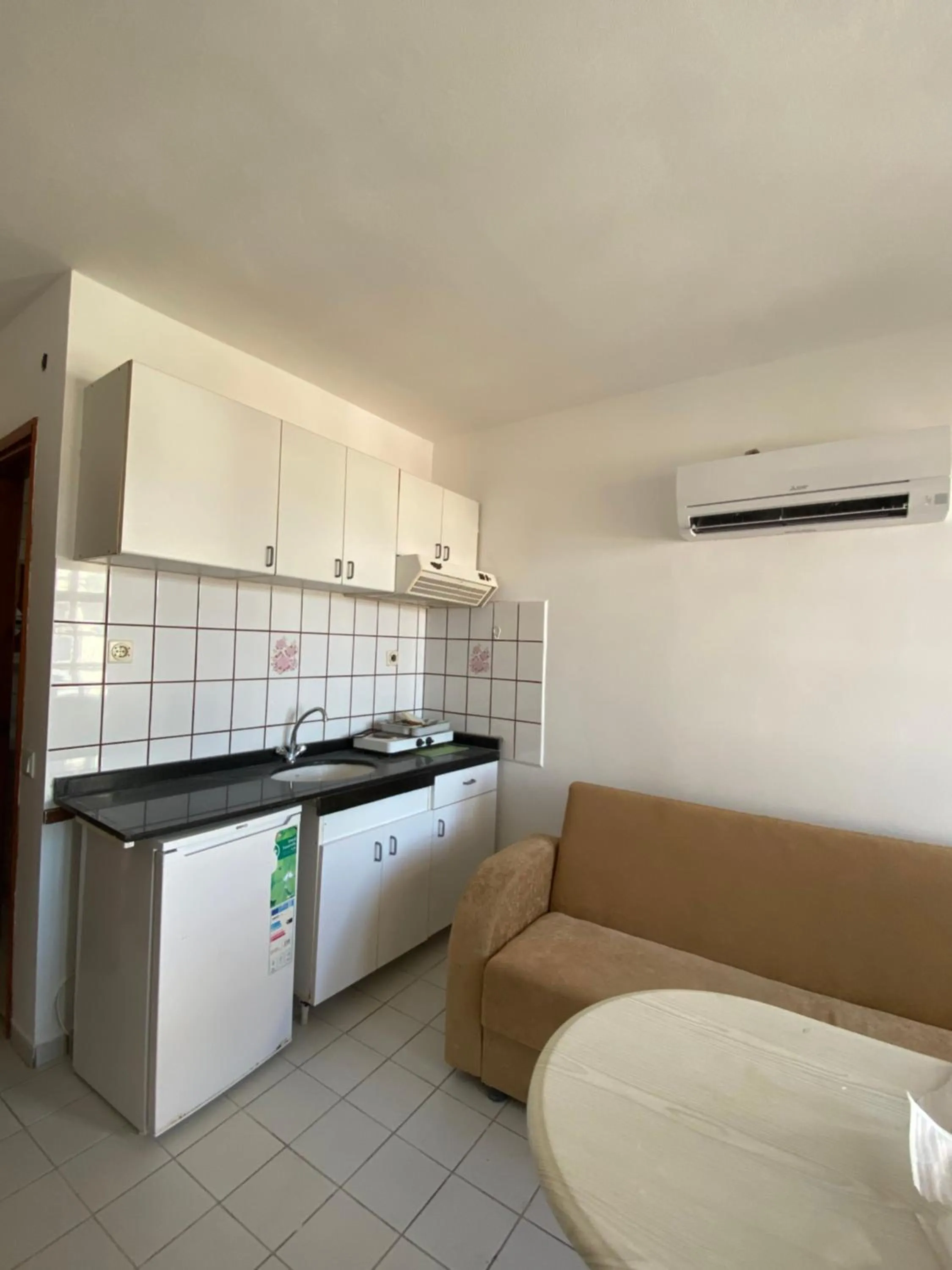 Kitchen or kitchenette in NATURELLA APART HOTEL