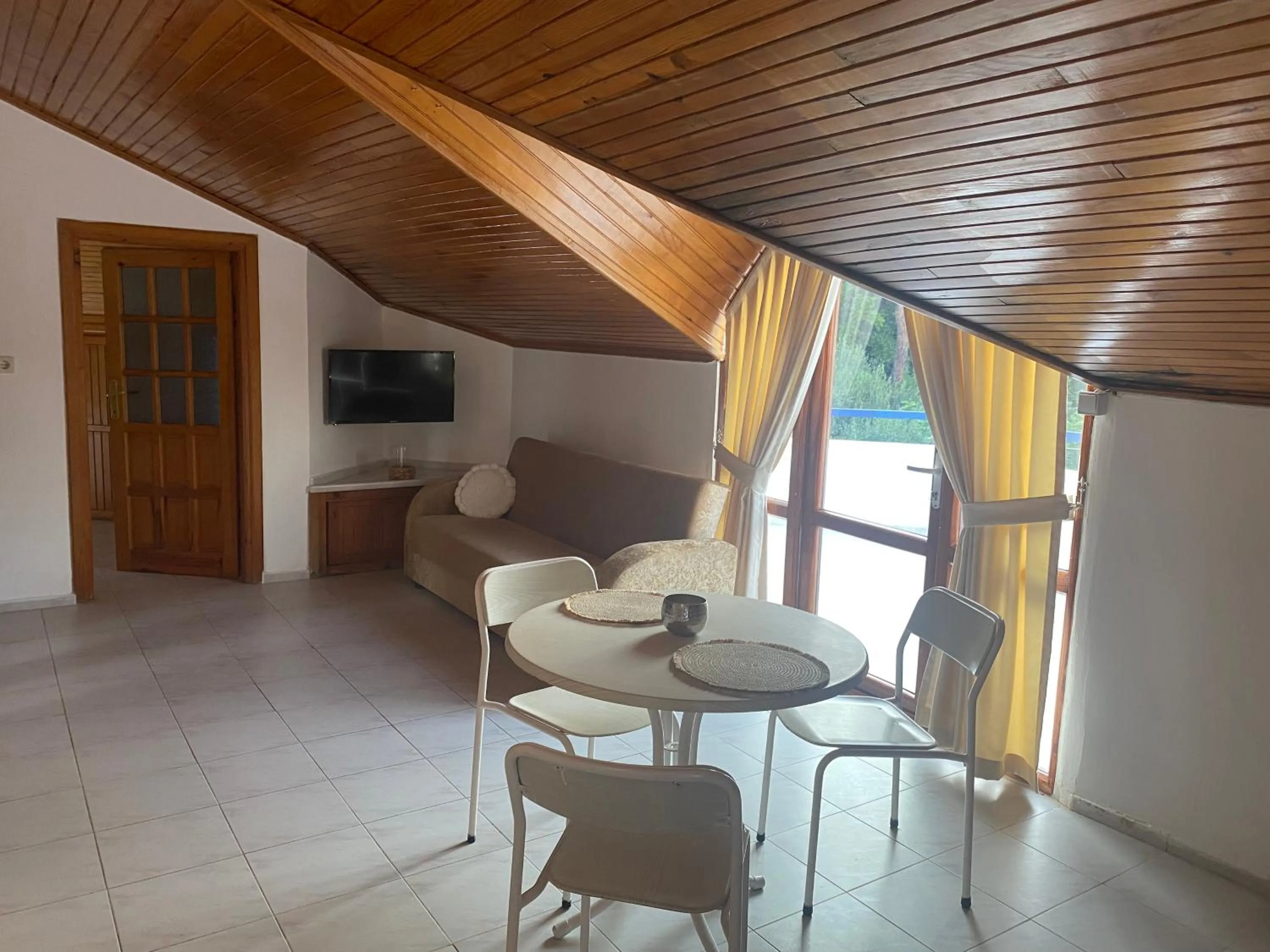 Seating area in NATURELLA APART HOTEL