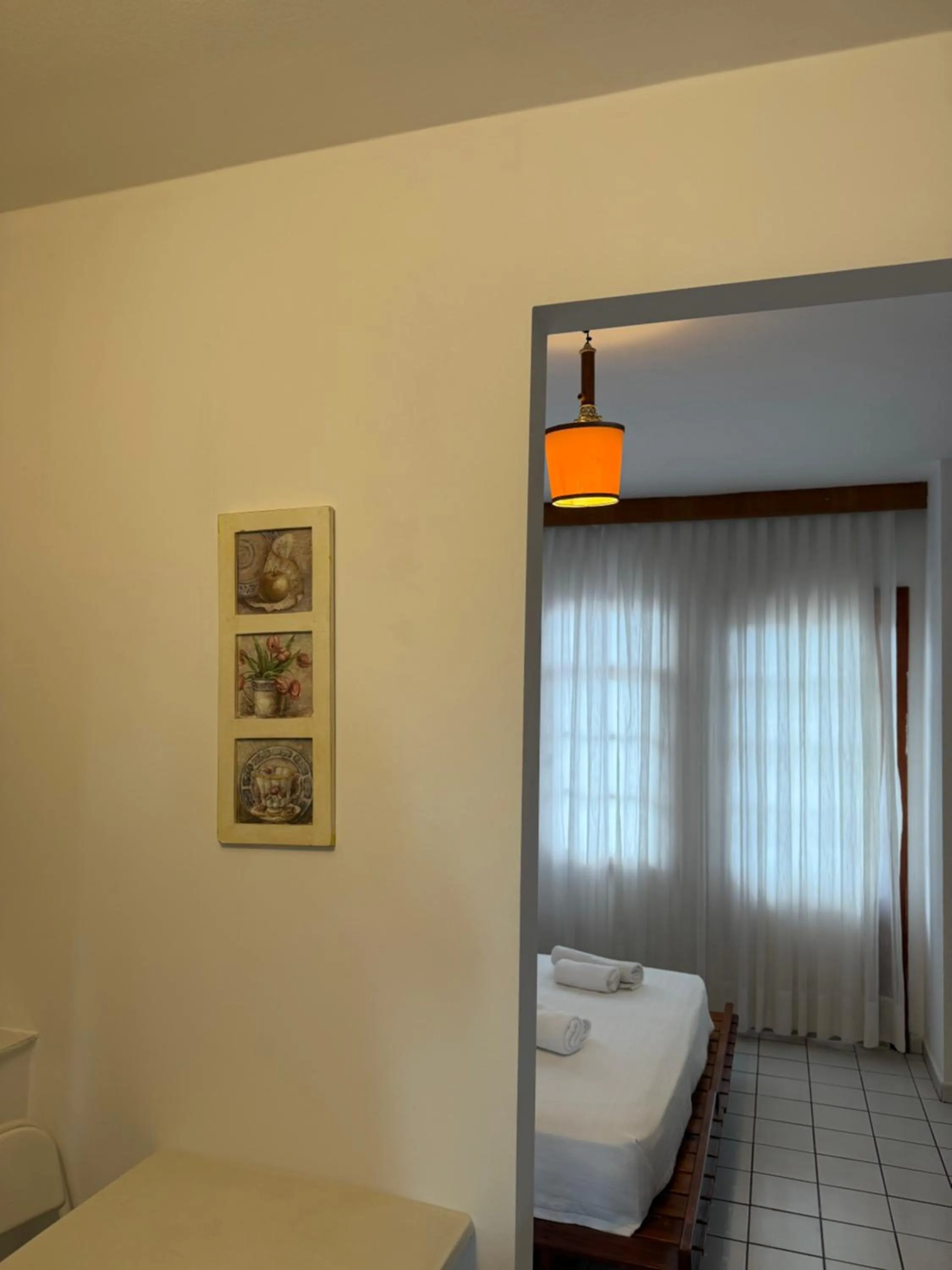 Bed in NATURELLA APART HOTEL