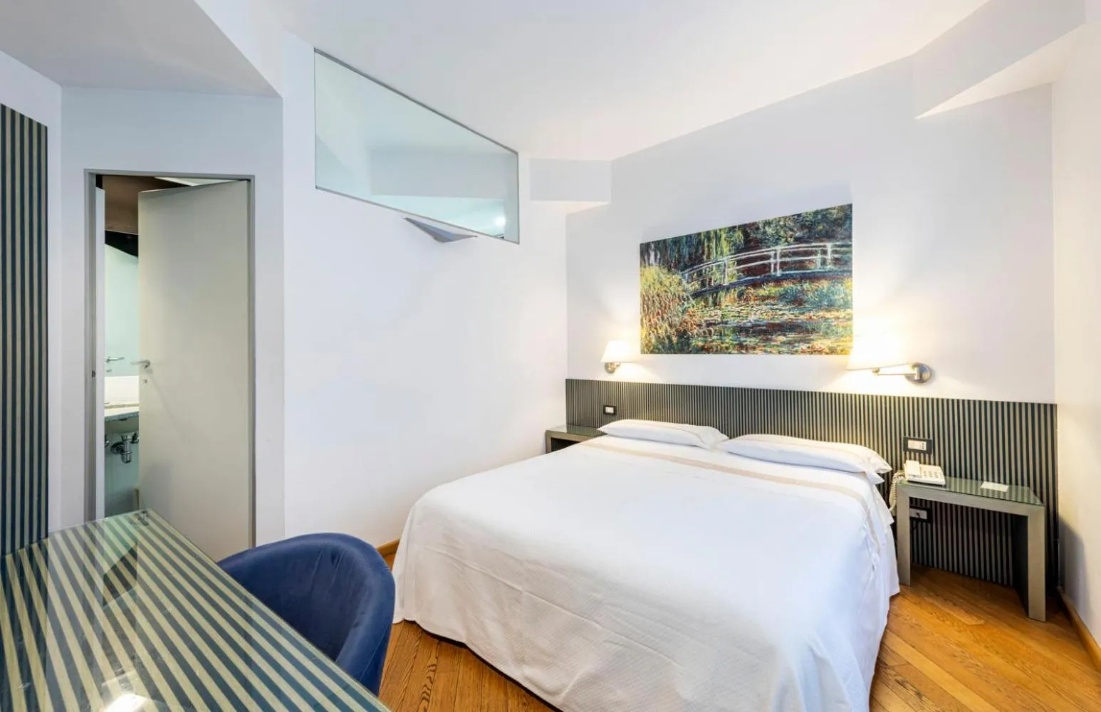 Bed in Hotel Metropole Suisse