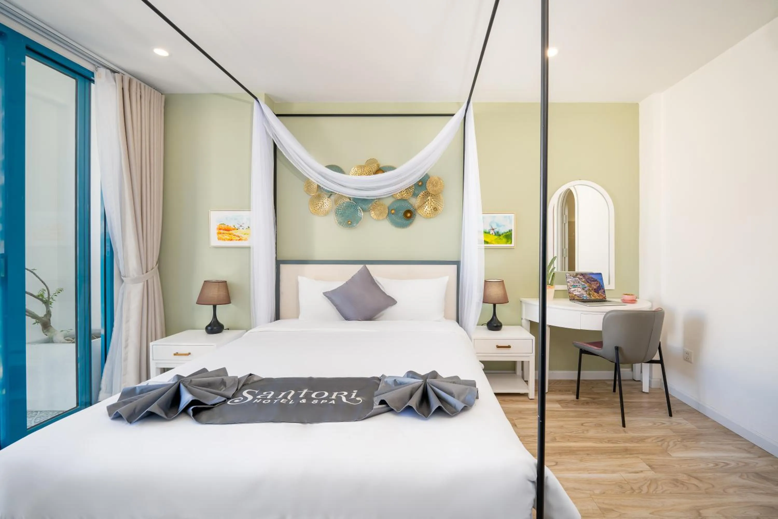 Bed in Santori Hotel And Spa