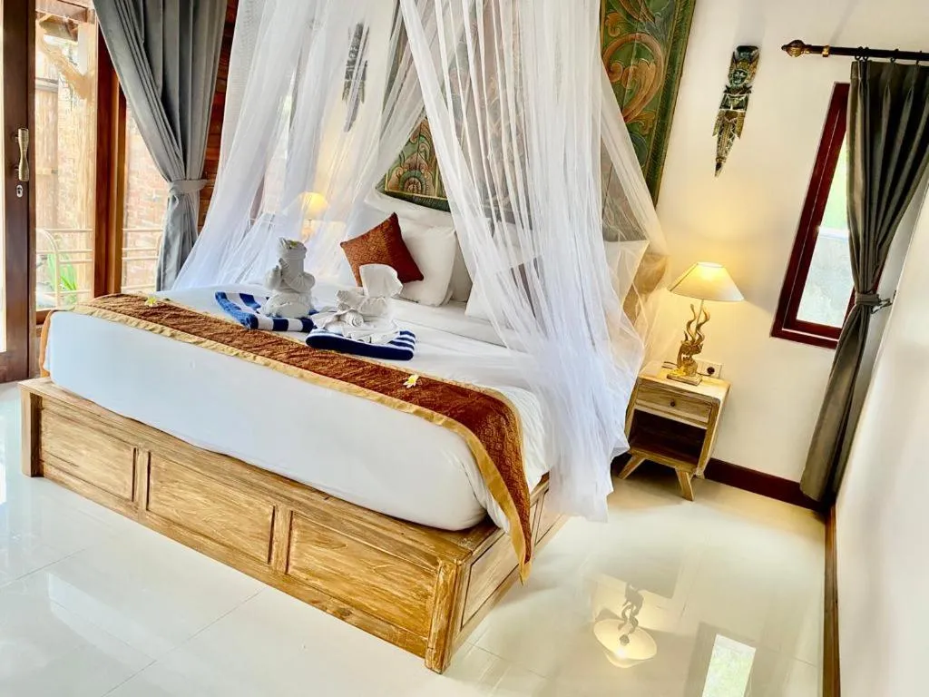 Bed in Sridewi Villas Ubud