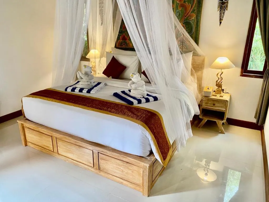 Bed in Sridewi Villas Ubud