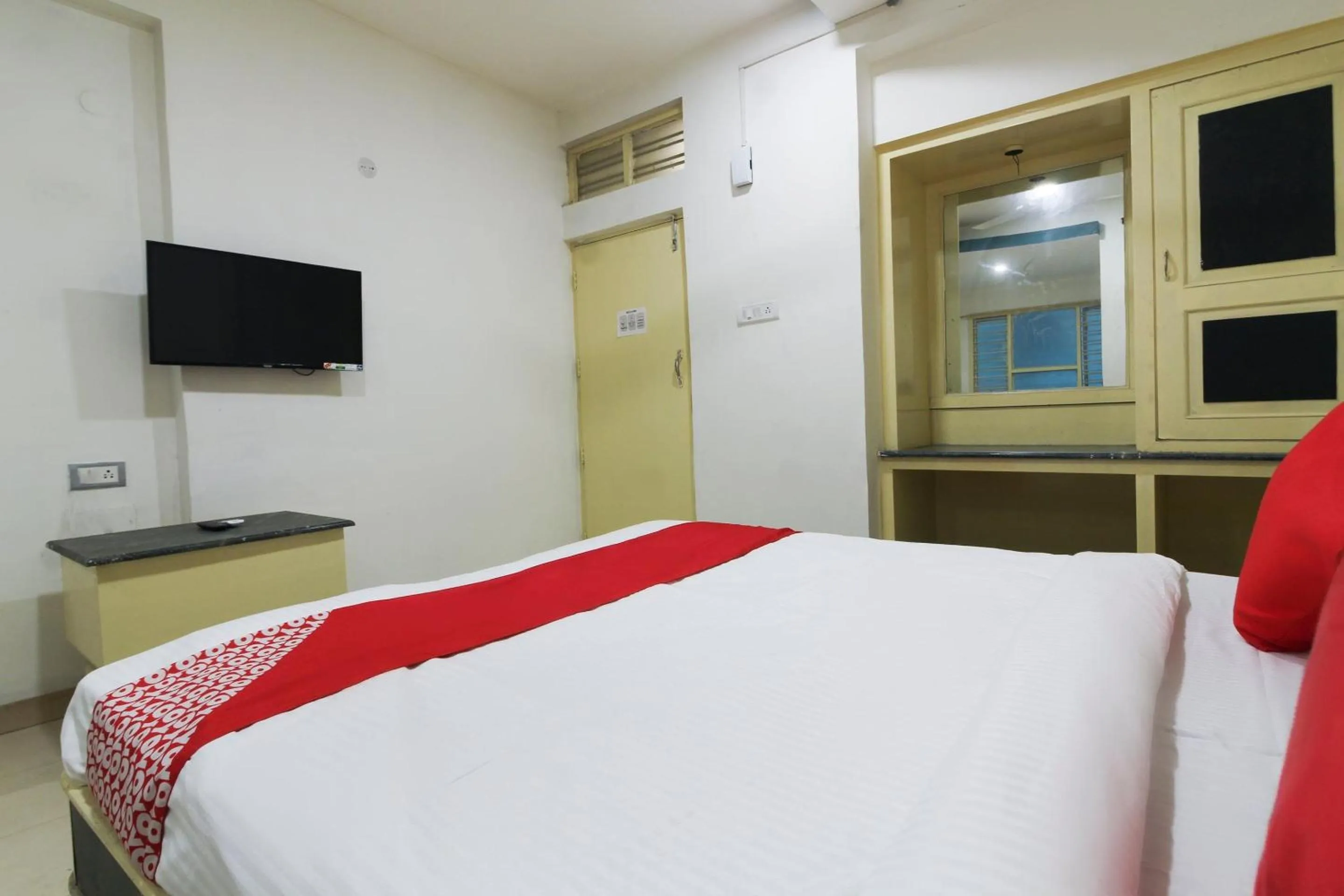 Bedroom, Bed in Hotel O by OYO V Square