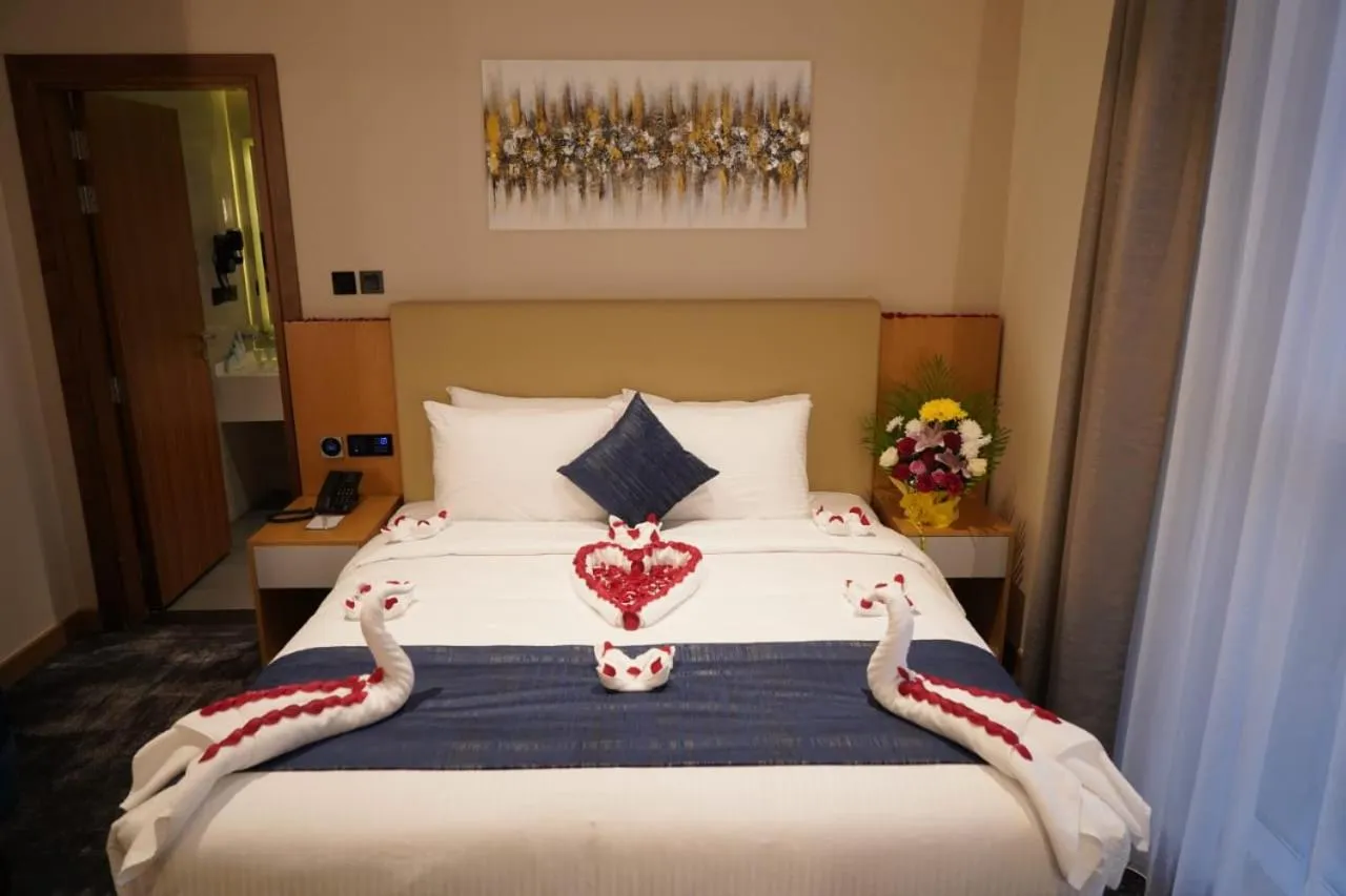 Bed in AL HAYAT HOTEL