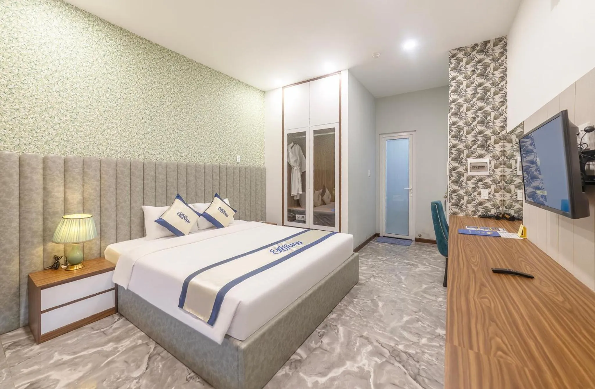 Bed in Tiffany Hotel & Restaurant