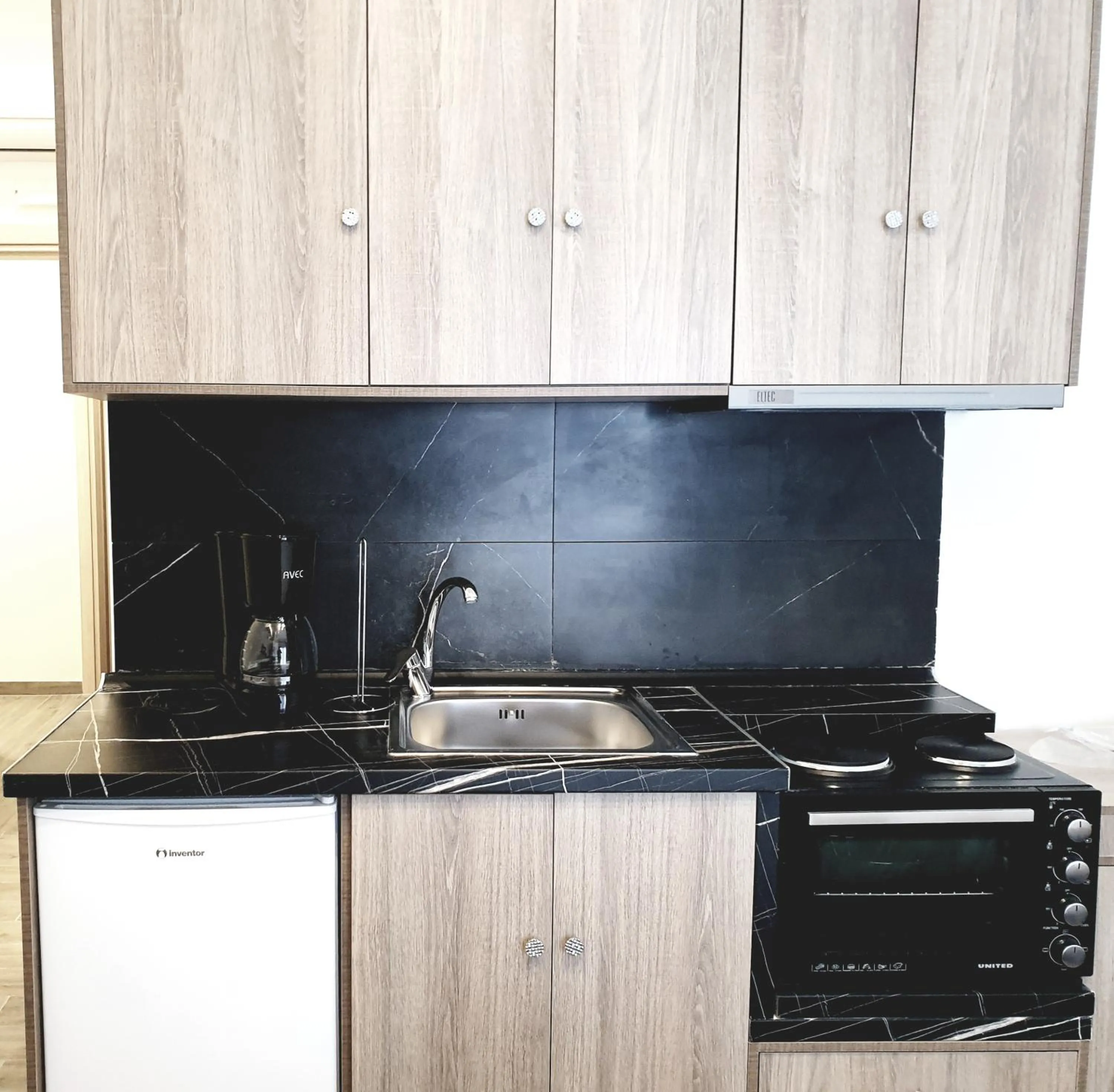 Kitchen or kitchenette in Eantos Studios and Suites