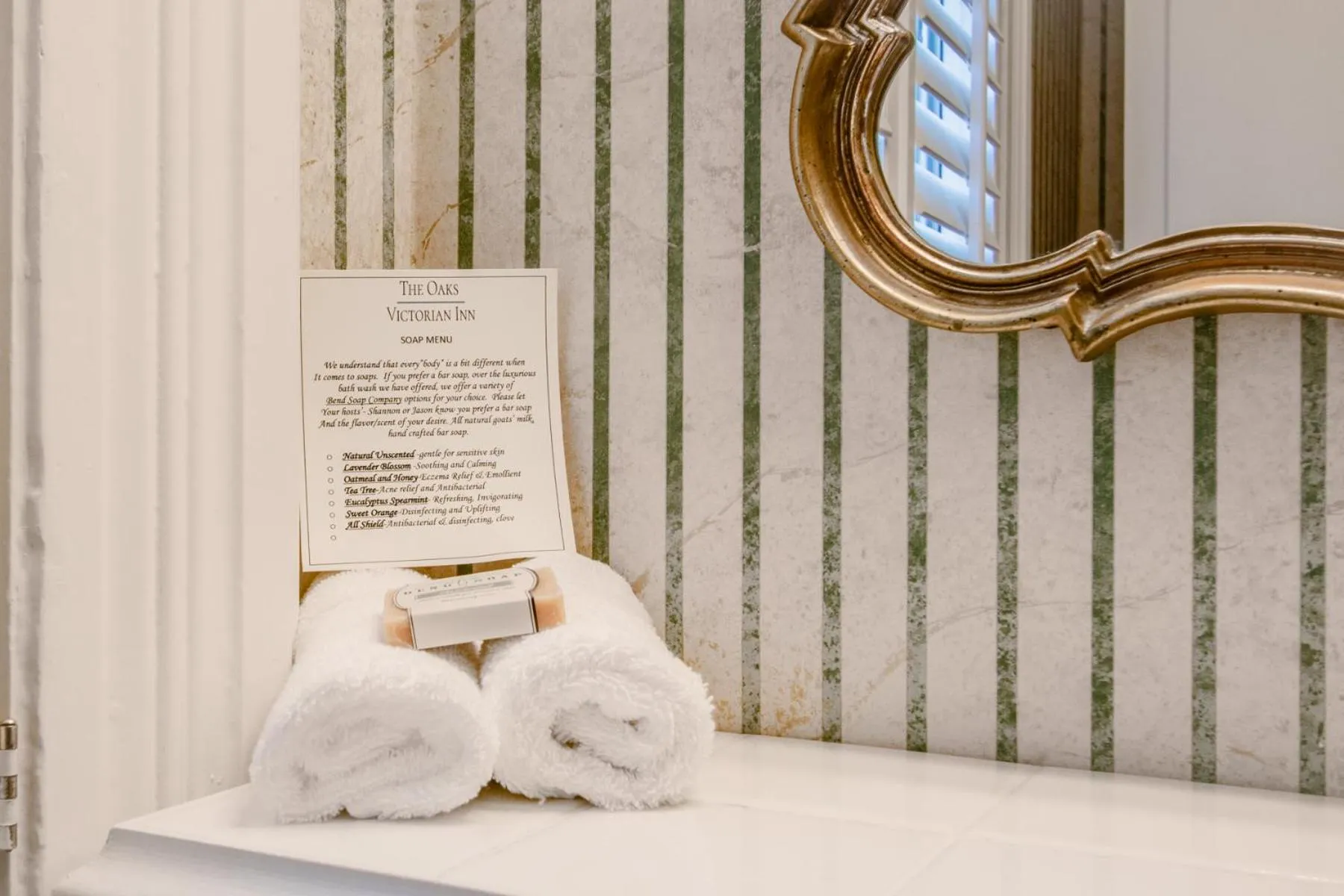 Bed in The Oaks Victorian Inn