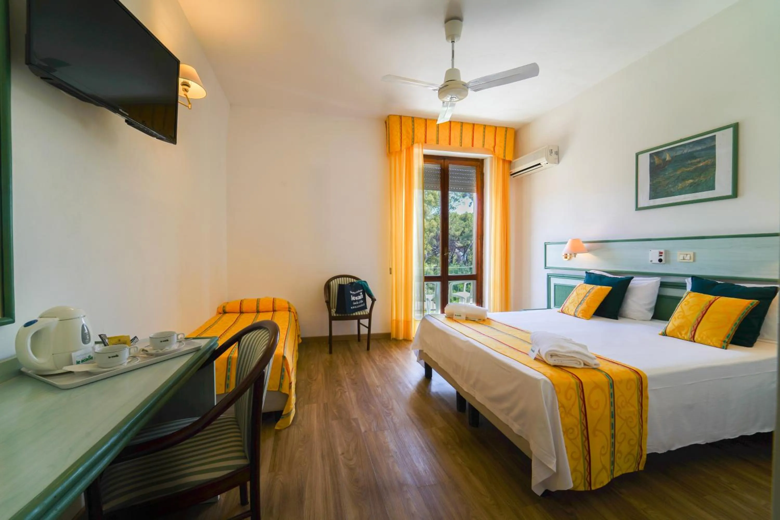 Bed in Hotel Le Acacie