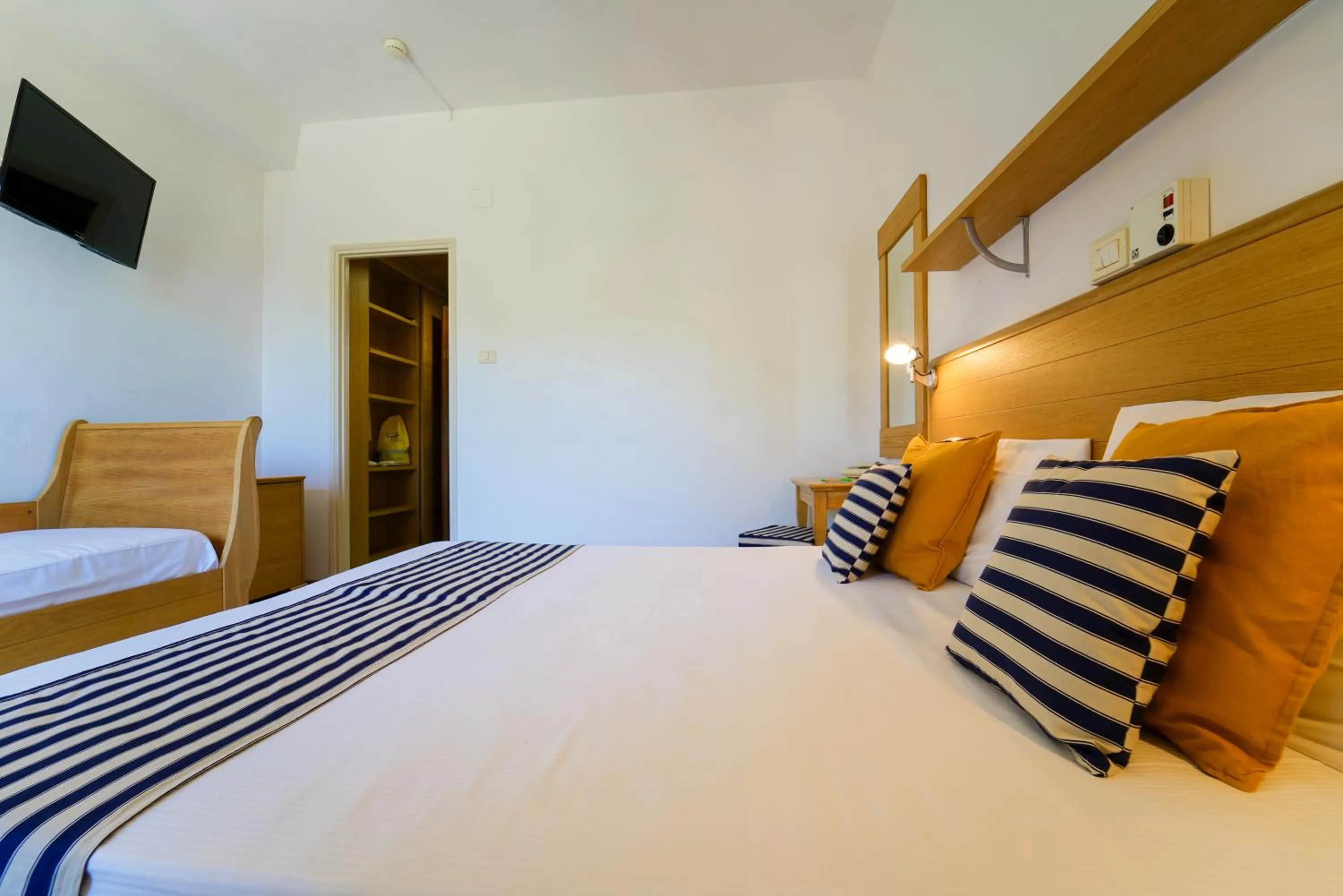 Bed in Hotel Le Acacie