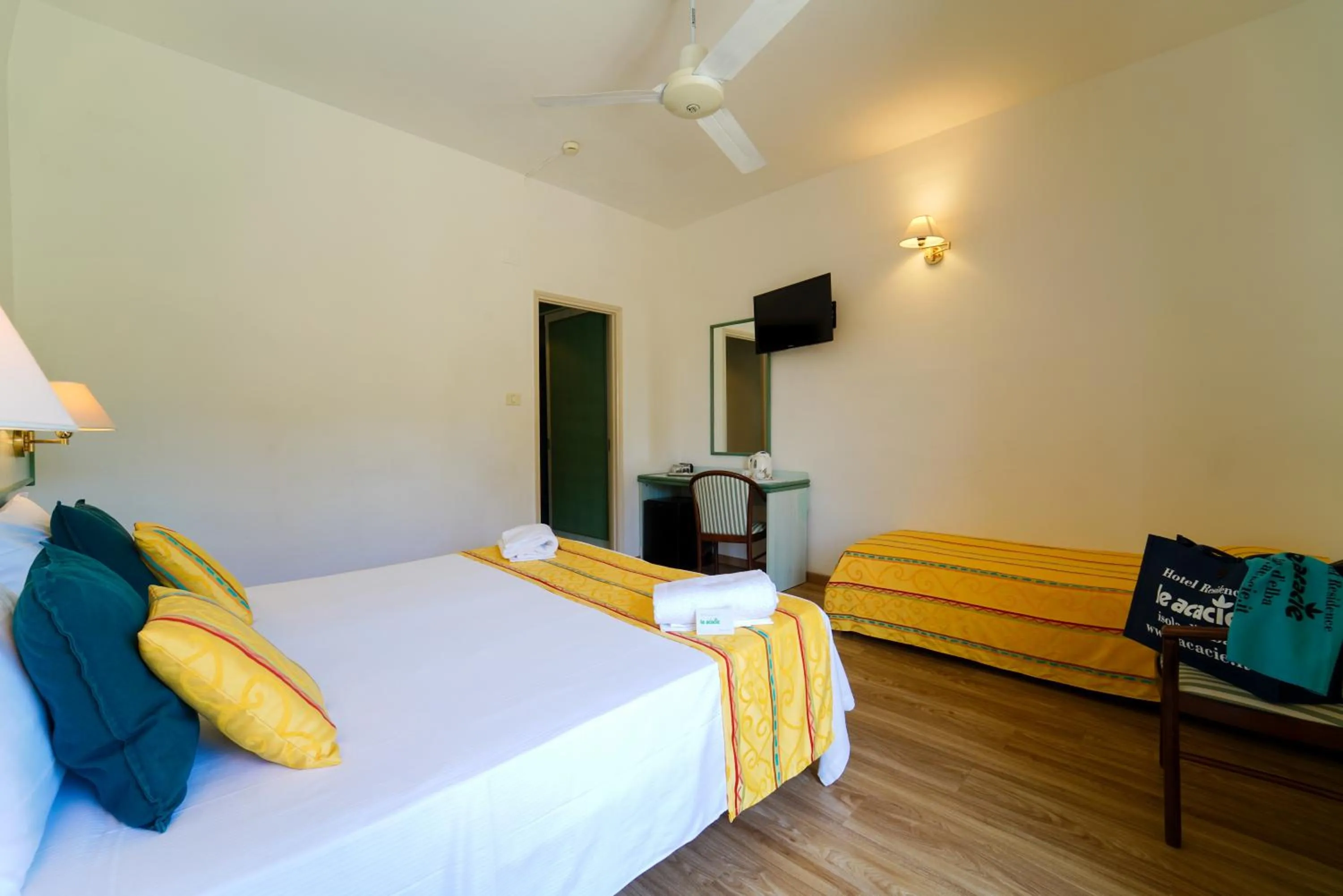 Bed in Hotel Le Acacie