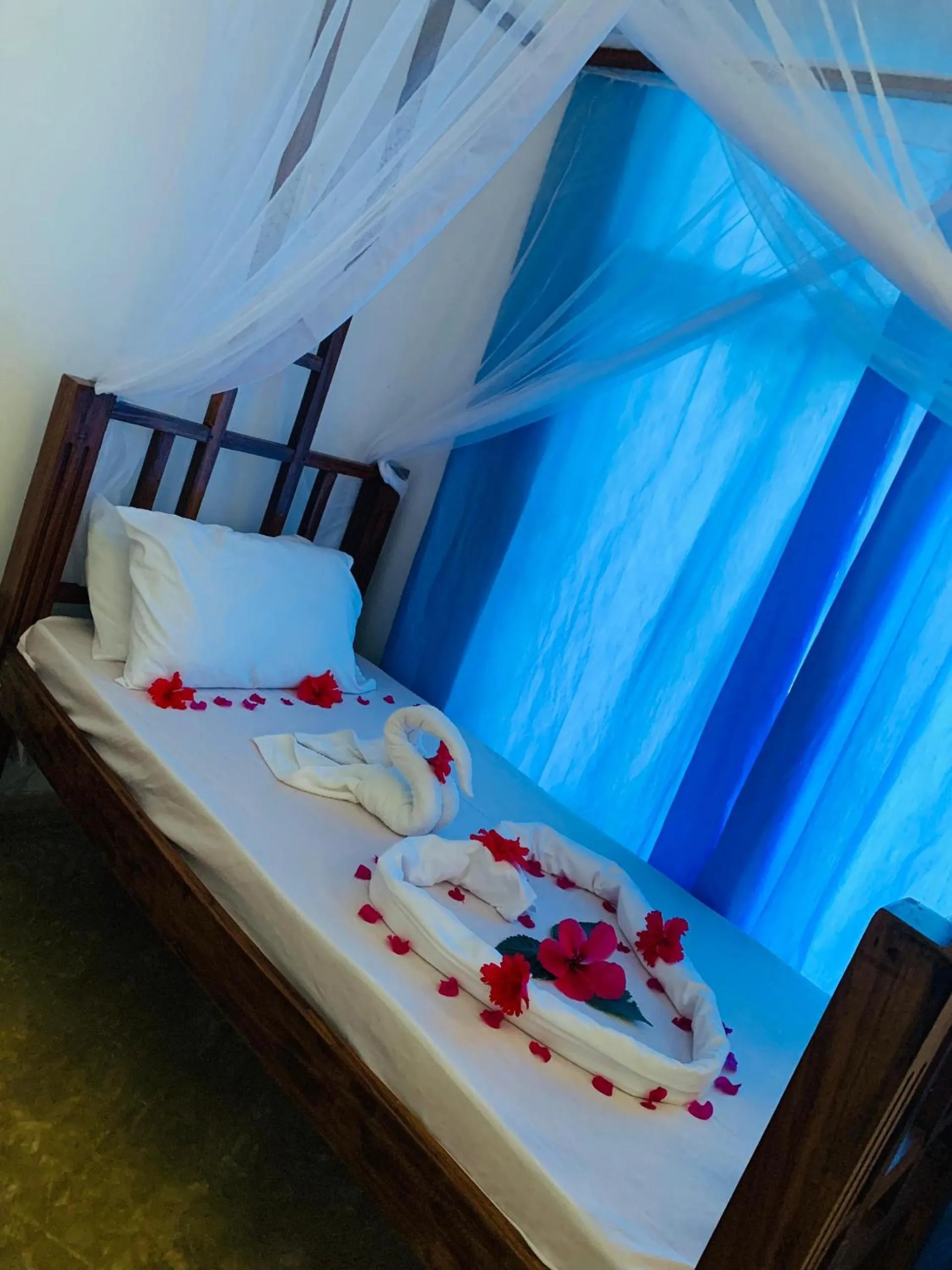 Bed in Serenity Boutique Hotel, Tanzania Unforgettable