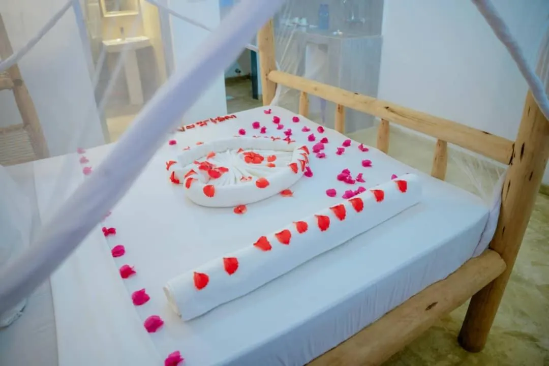 Bed in Serenity Boutique Hotel, Tanzania Unforgettable