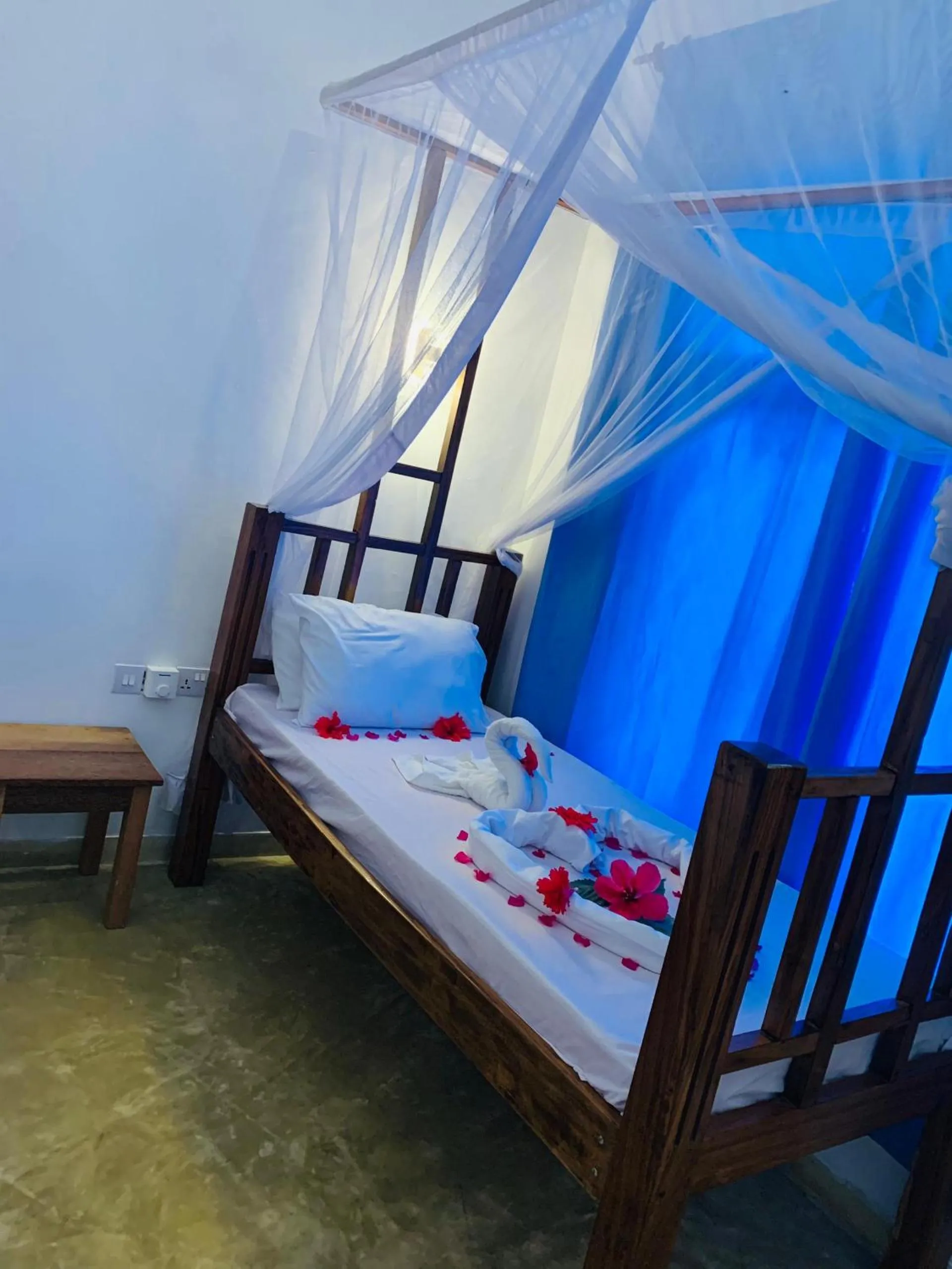 Bed in Serenity Boutique Hotel, Tanzania Unforgettable