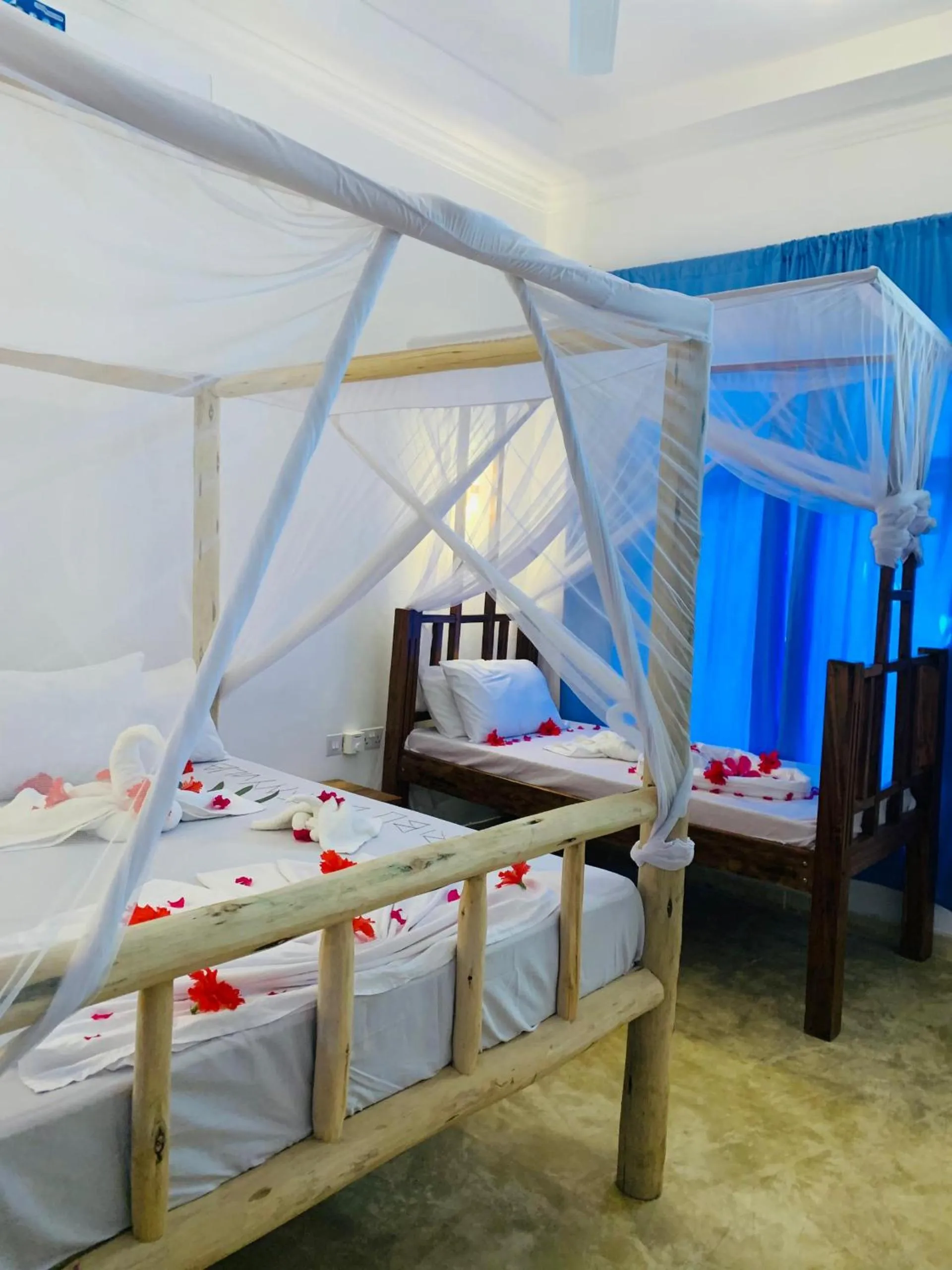 Bed in Serenity Boutique Hotel, Tanzania Unforgettable