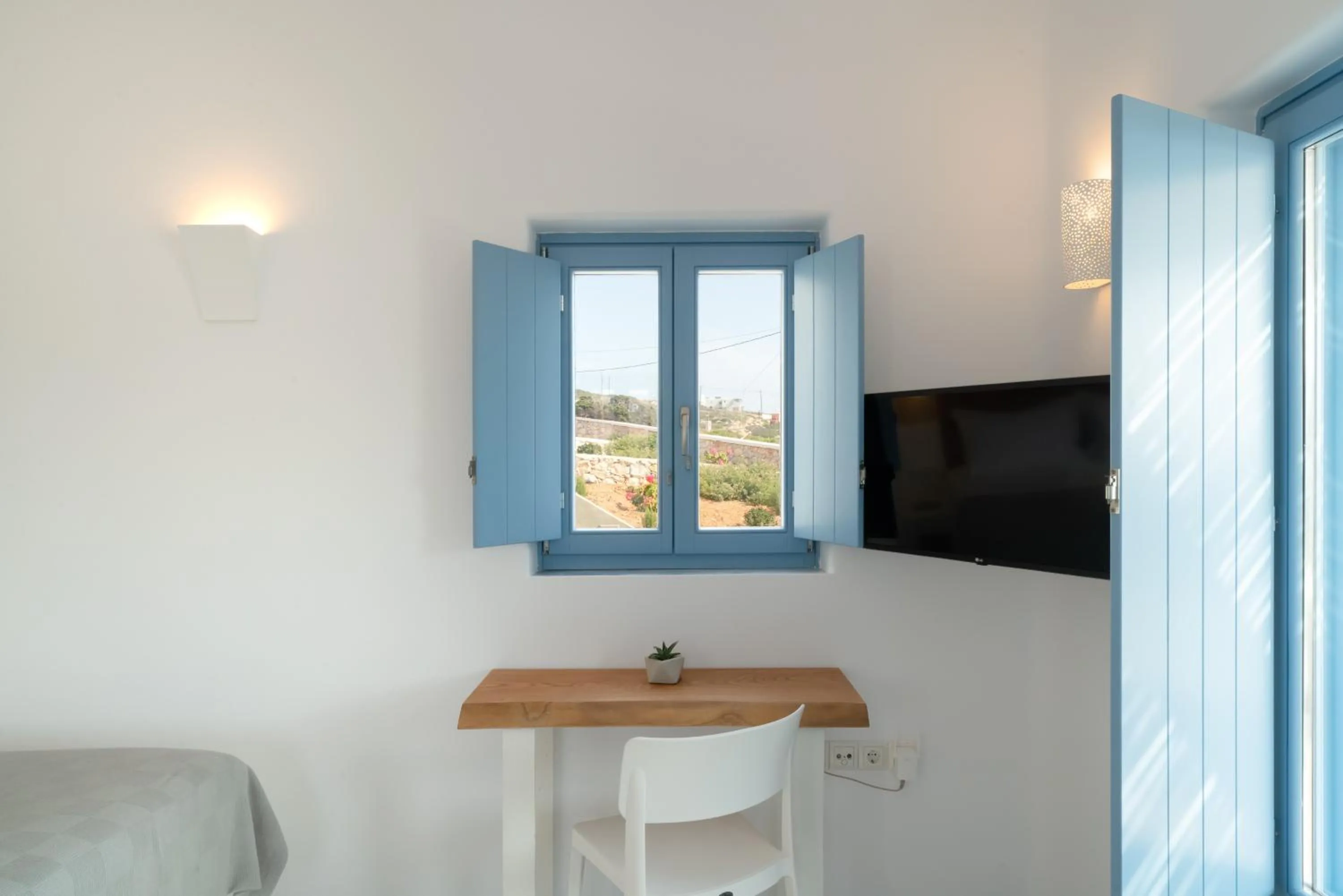 Seating area in Camvillia Donoussa Village Suites