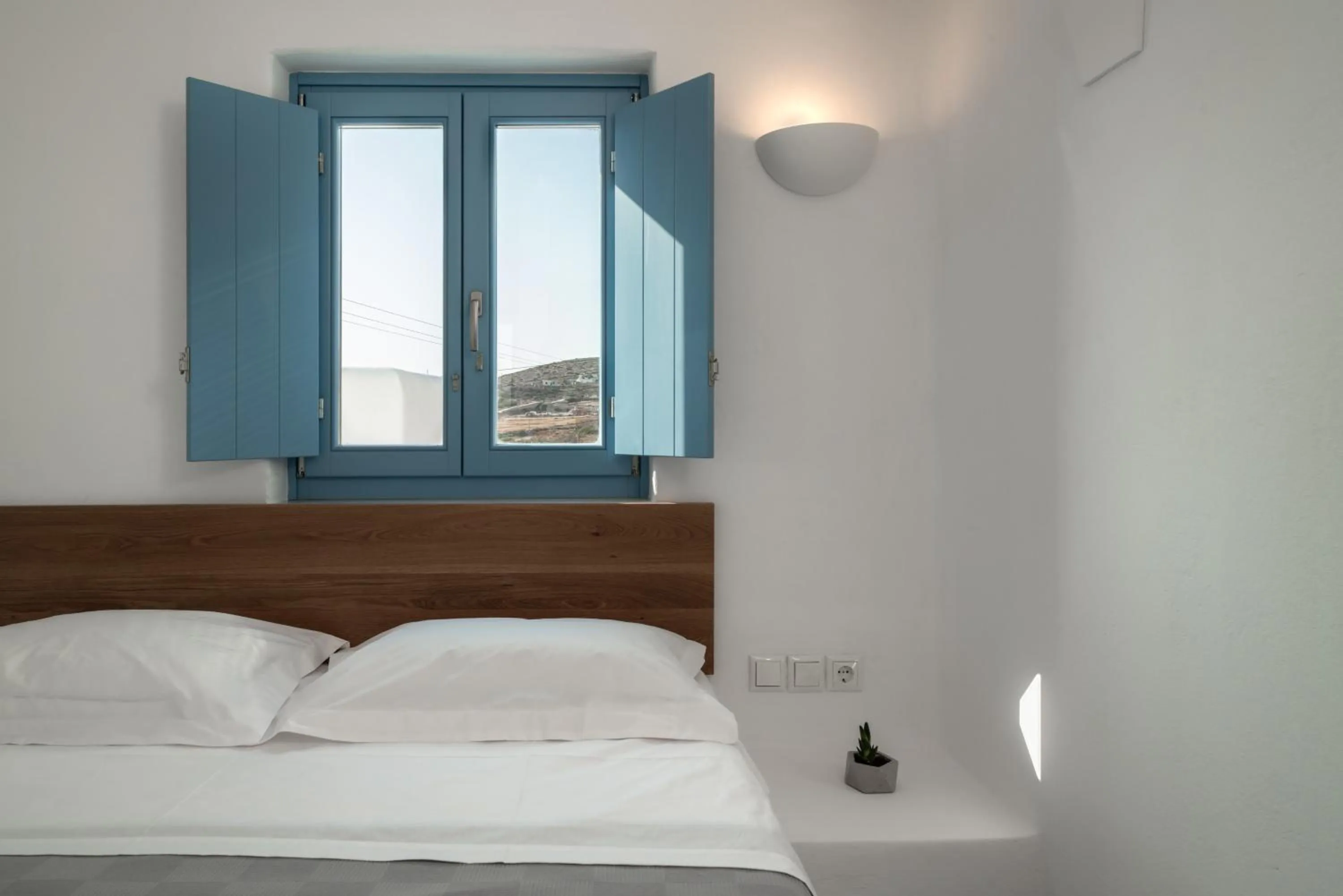 Bed in Camvillia Donoussa Village Suites