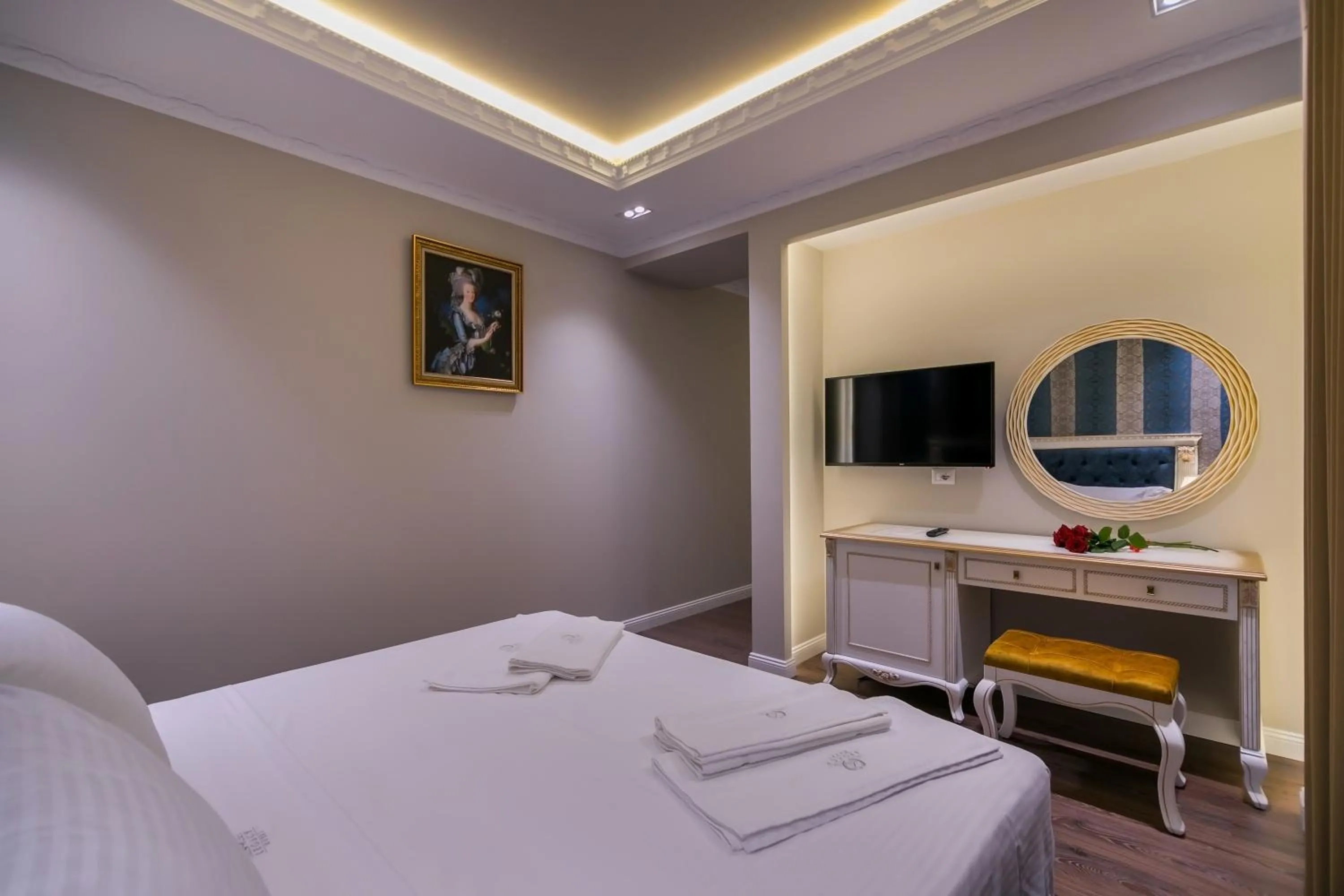 Bed in Legacy Boutique Hotel