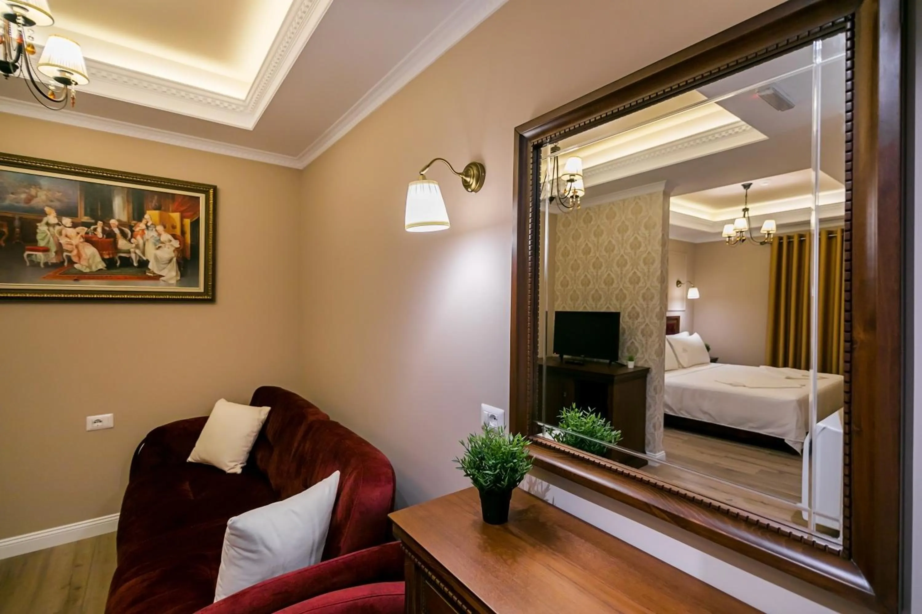 Living room, Bed in Legacy Boutique Hotel