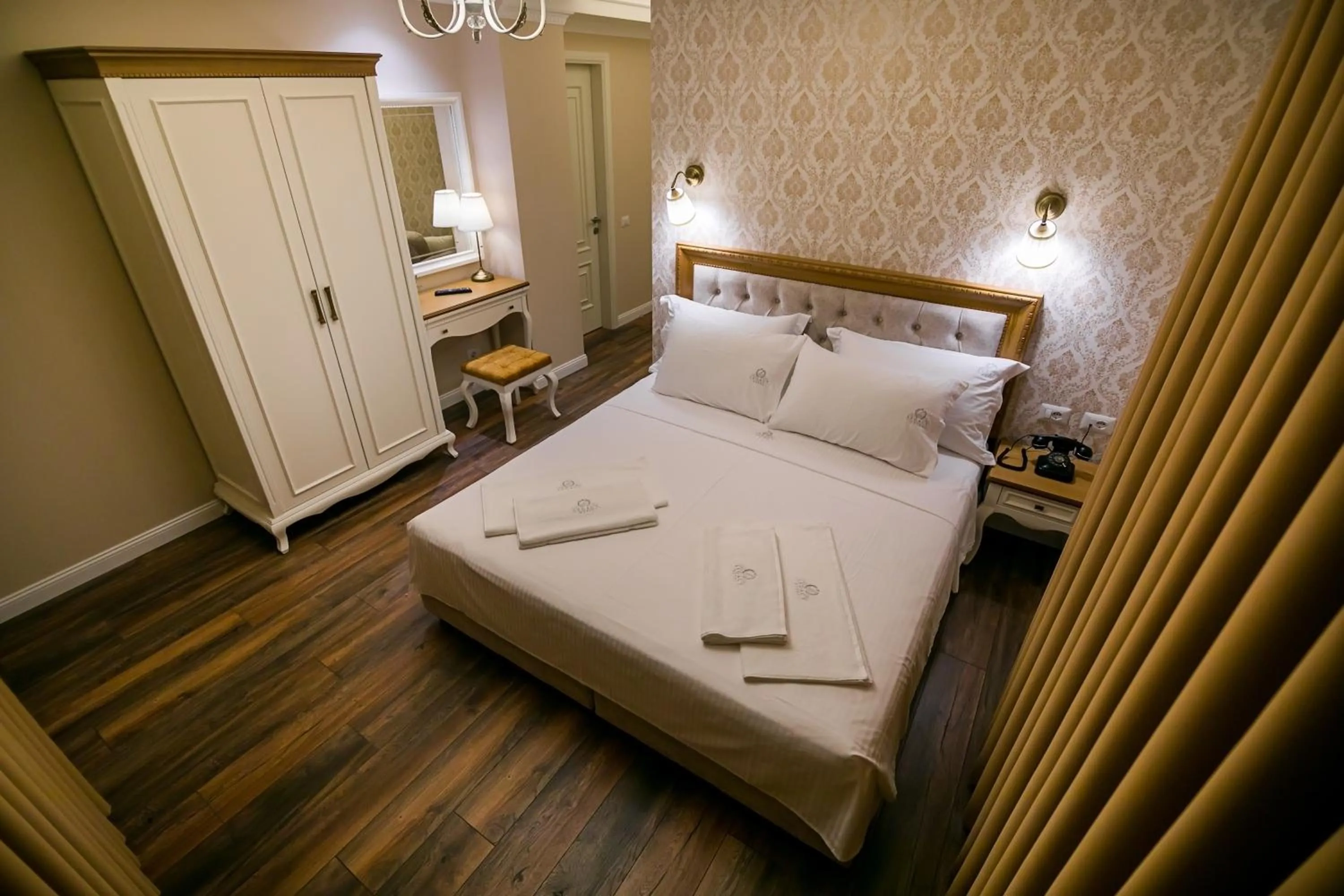 Bed in Legacy Boutique Hotel