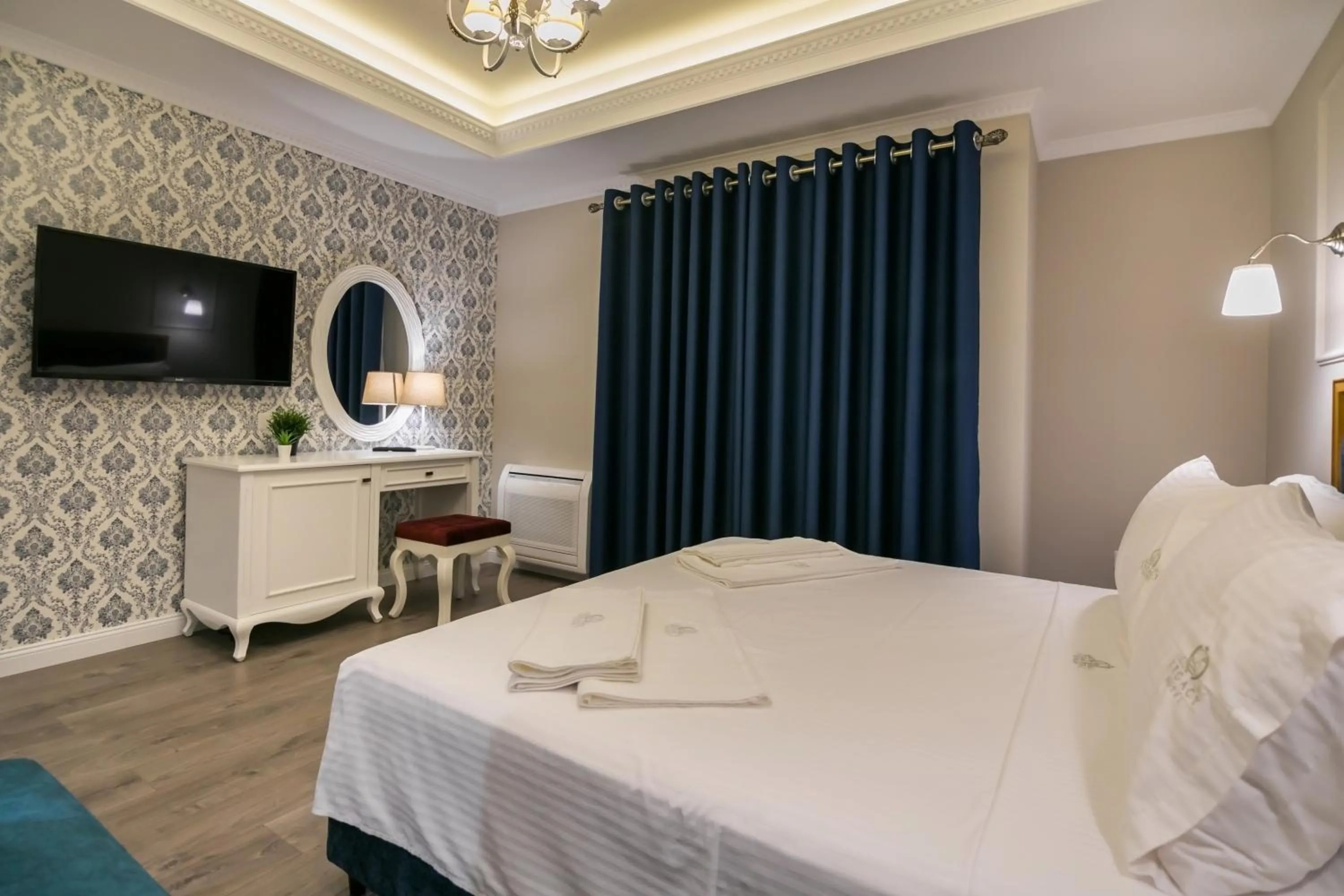 Bed in Legacy Boutique Hotel