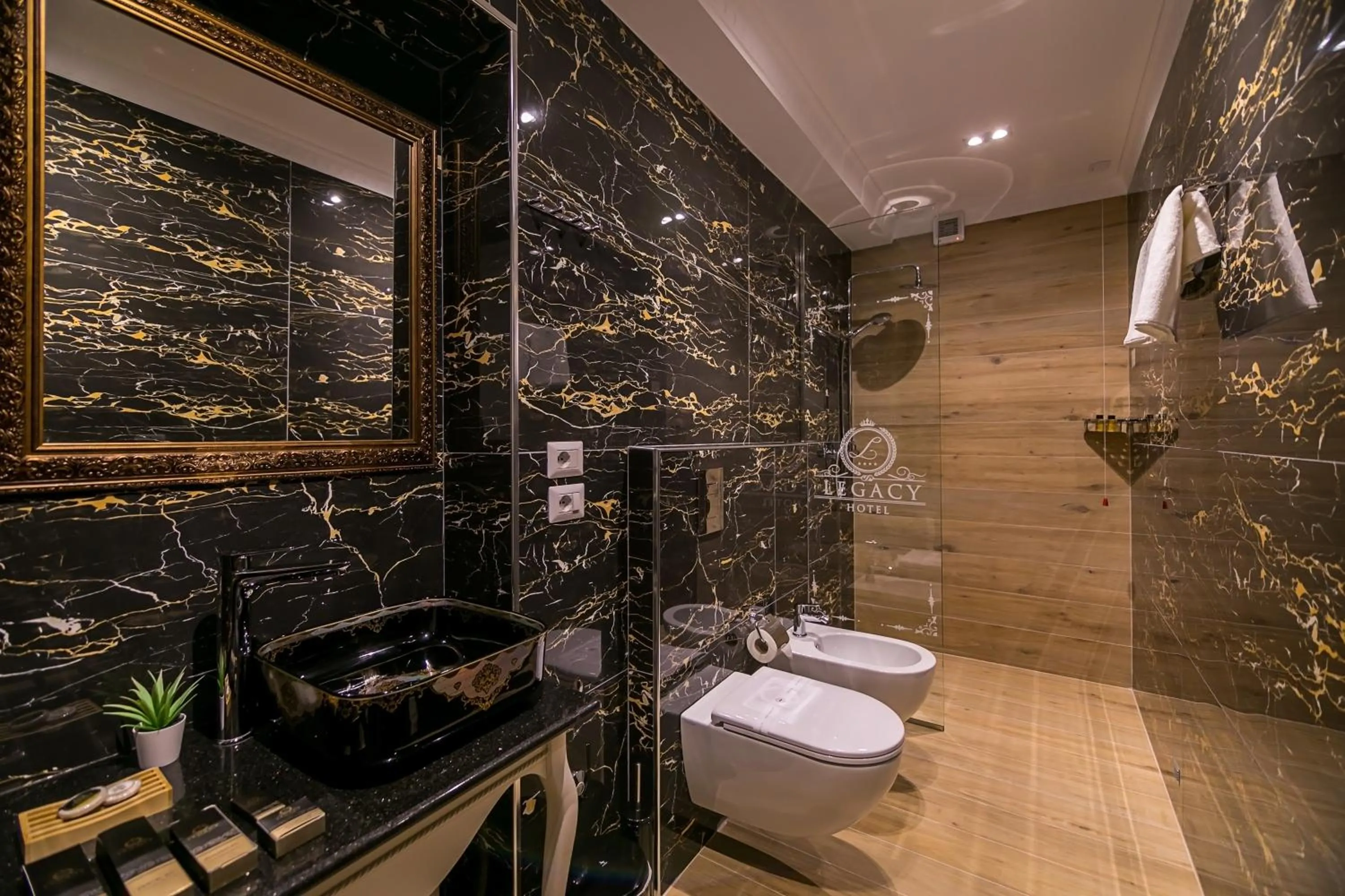 Toilet in Legacy Boutique Hotel