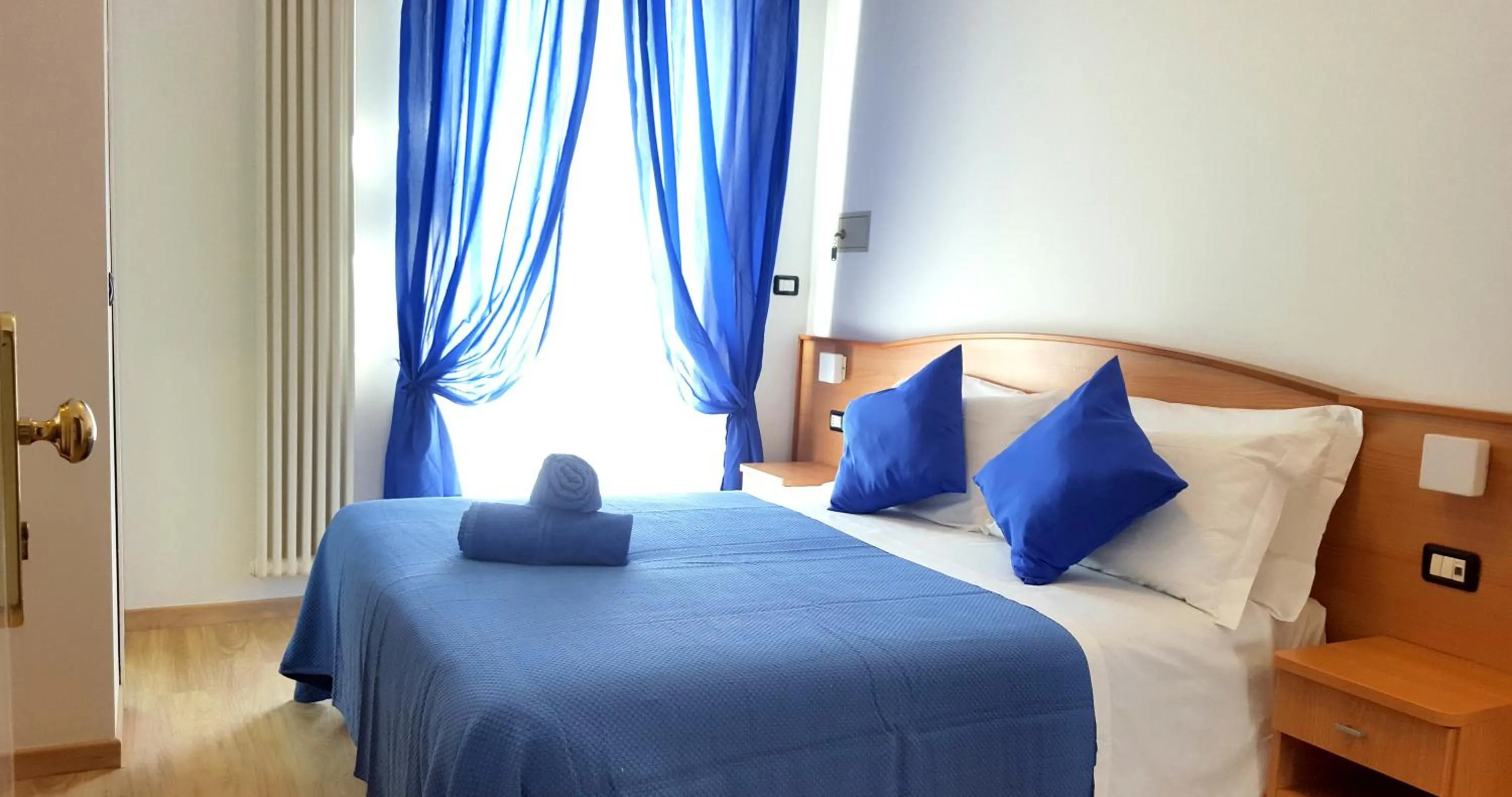 Bed in Hotel Mare Blu -- boutique