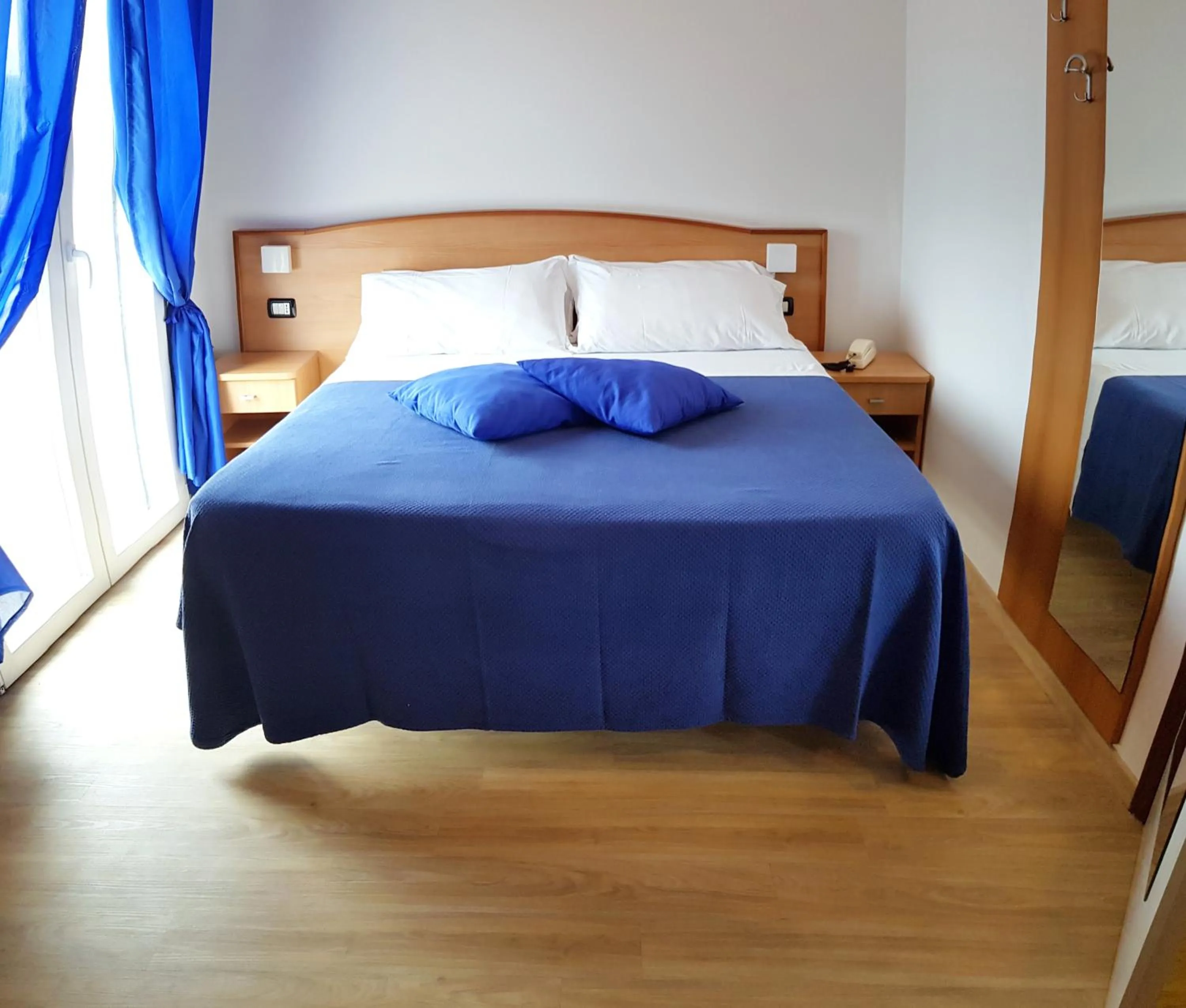 Bed in Hotel Mare Blu -- boutique