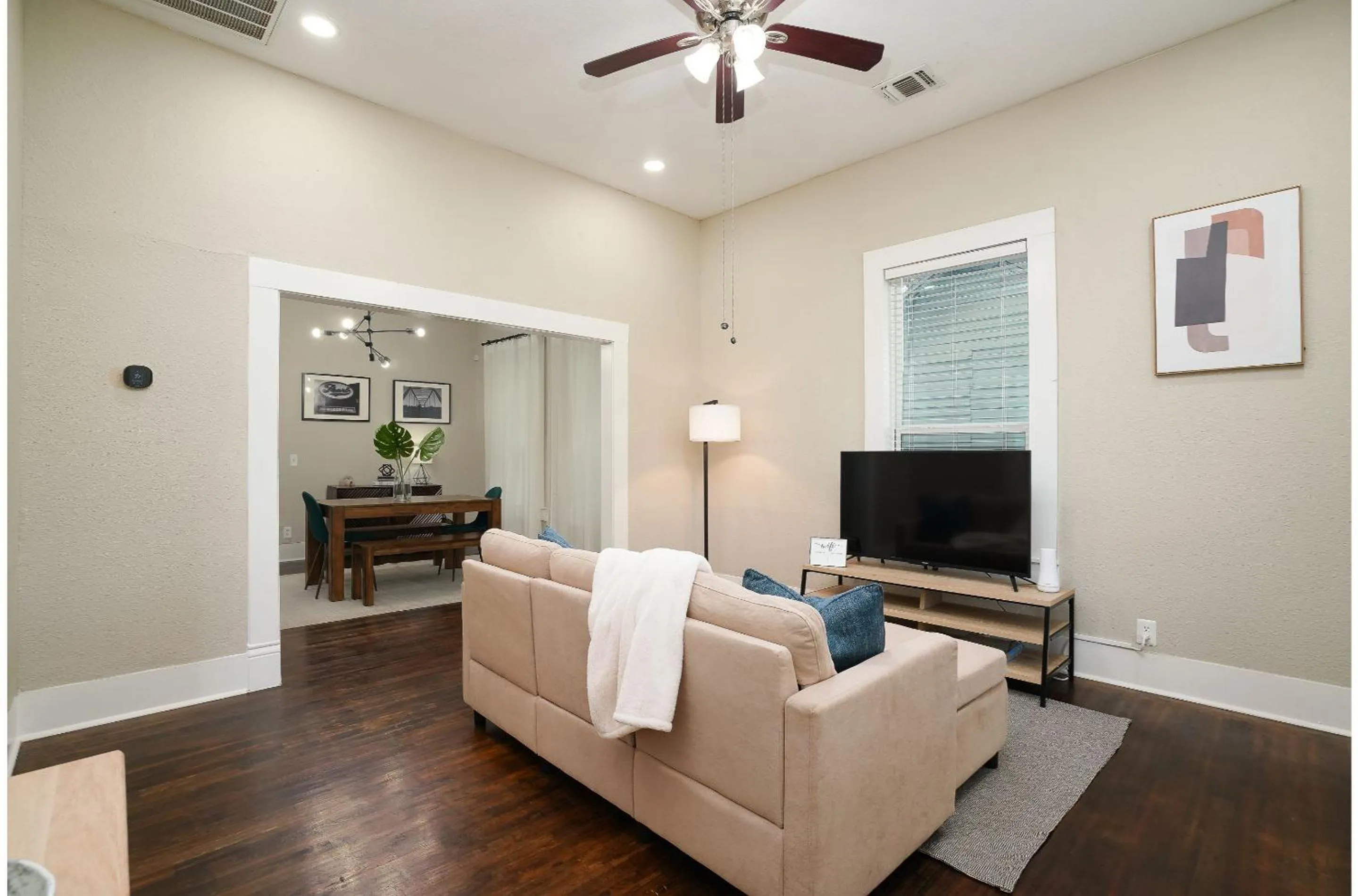 Living room in Amazing Fully Fenced Home Only 5 Mins from Downtown