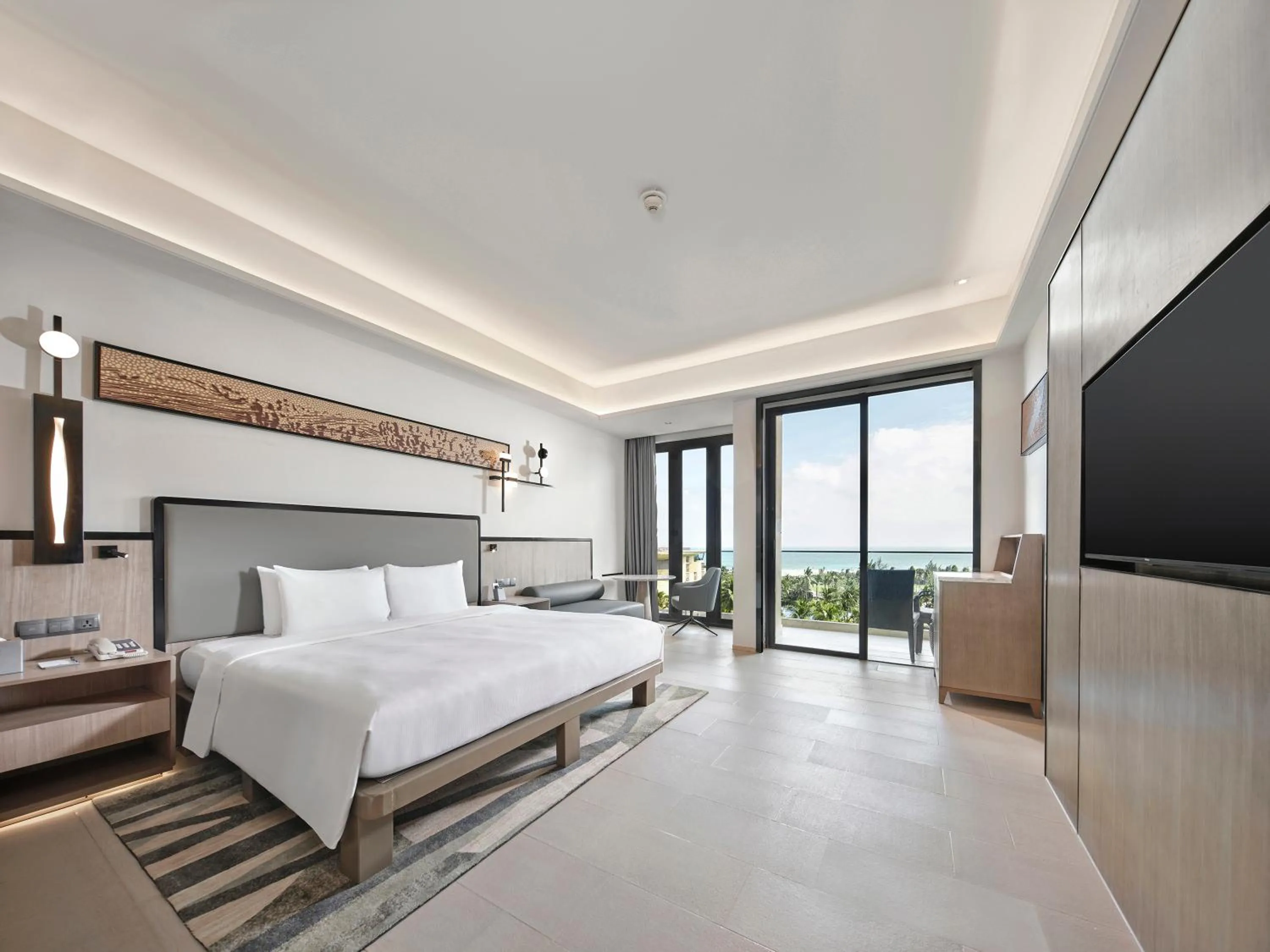 Photo of the whole room, Bed in Wanda Realm Resort Sanya Haitang Bay