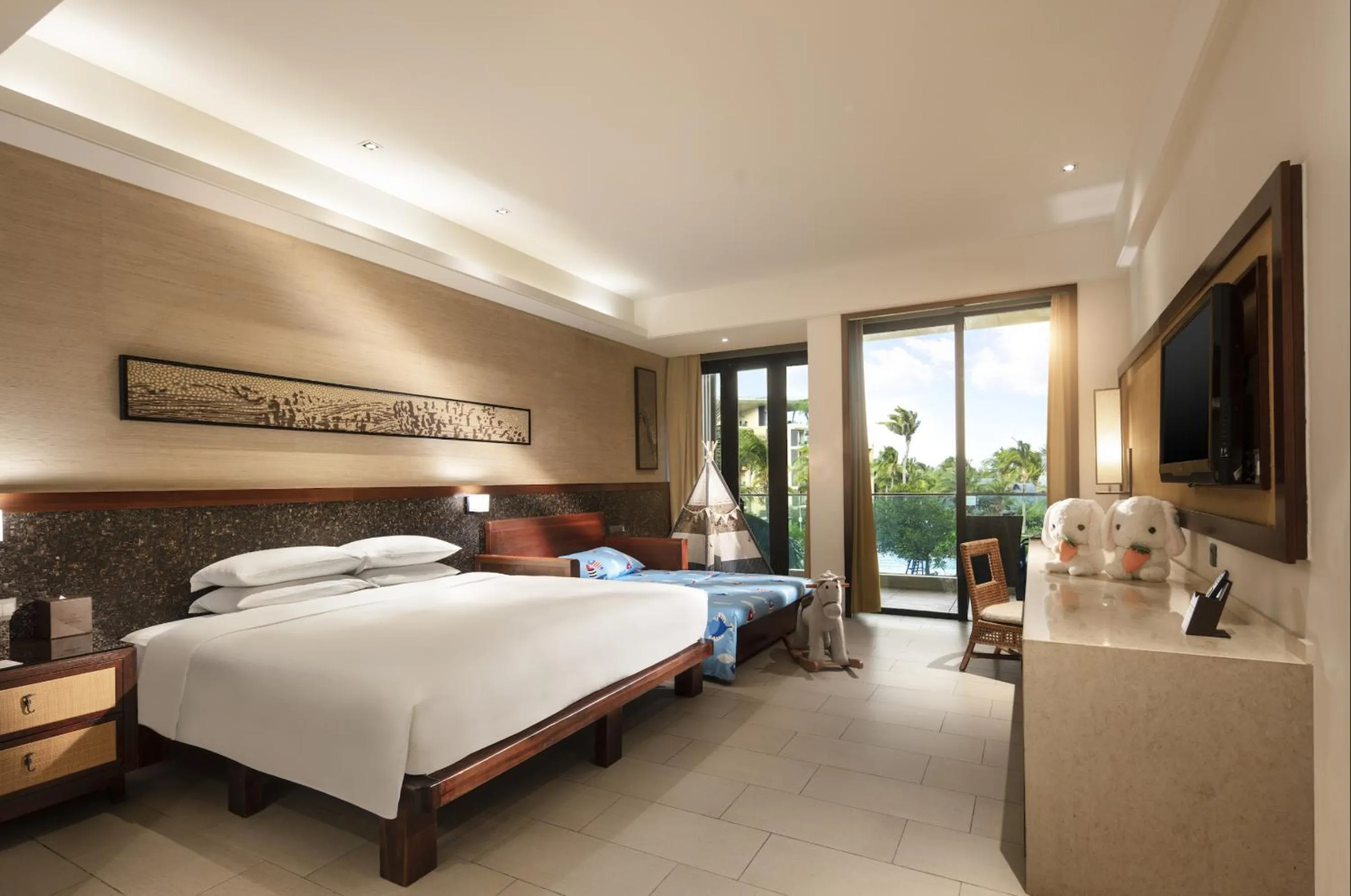 Photo of the whole room, Bed in Wanda Realm Resort Sanya Haitang Bay