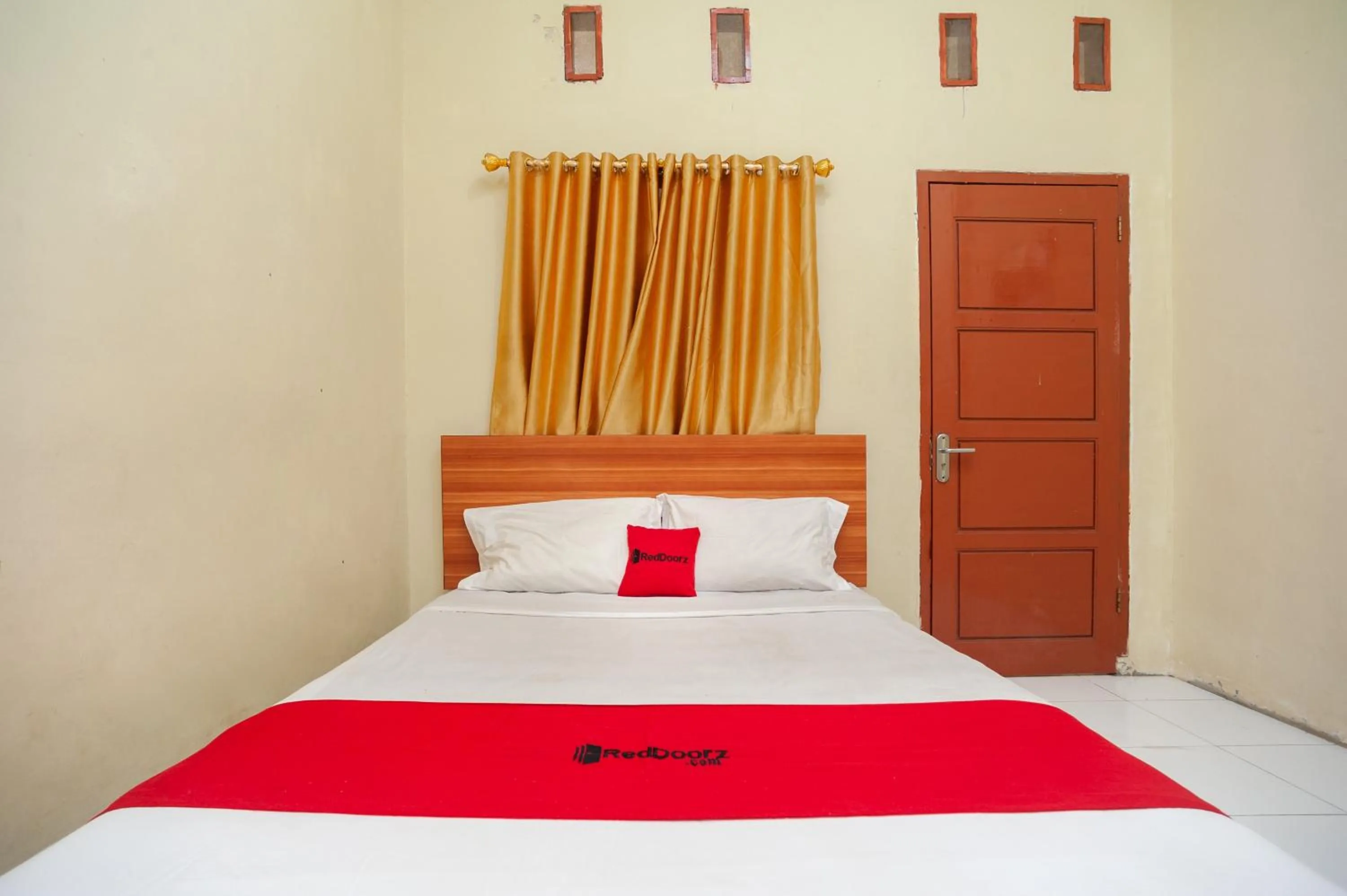 Bed in RedDoorz near Universitas Muhammadiyah Pringsewu
