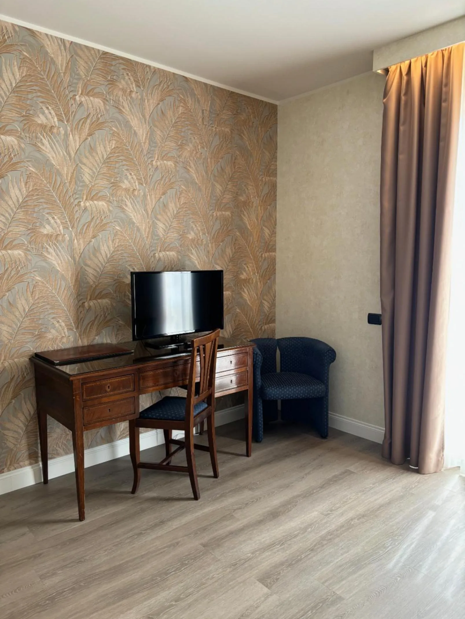 Seating area in Perugia Plaza Hotel