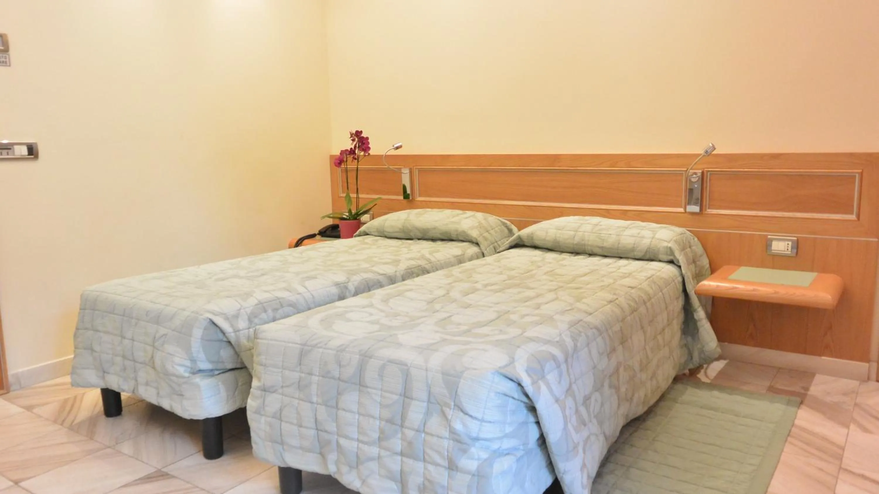 Bed in Hotel Sempione