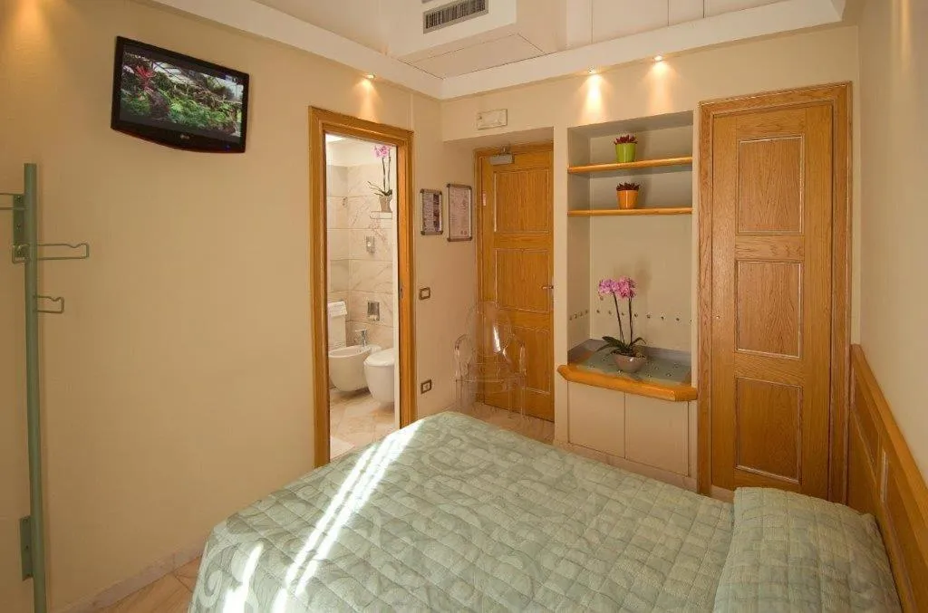 Bed in Hotel Sempione