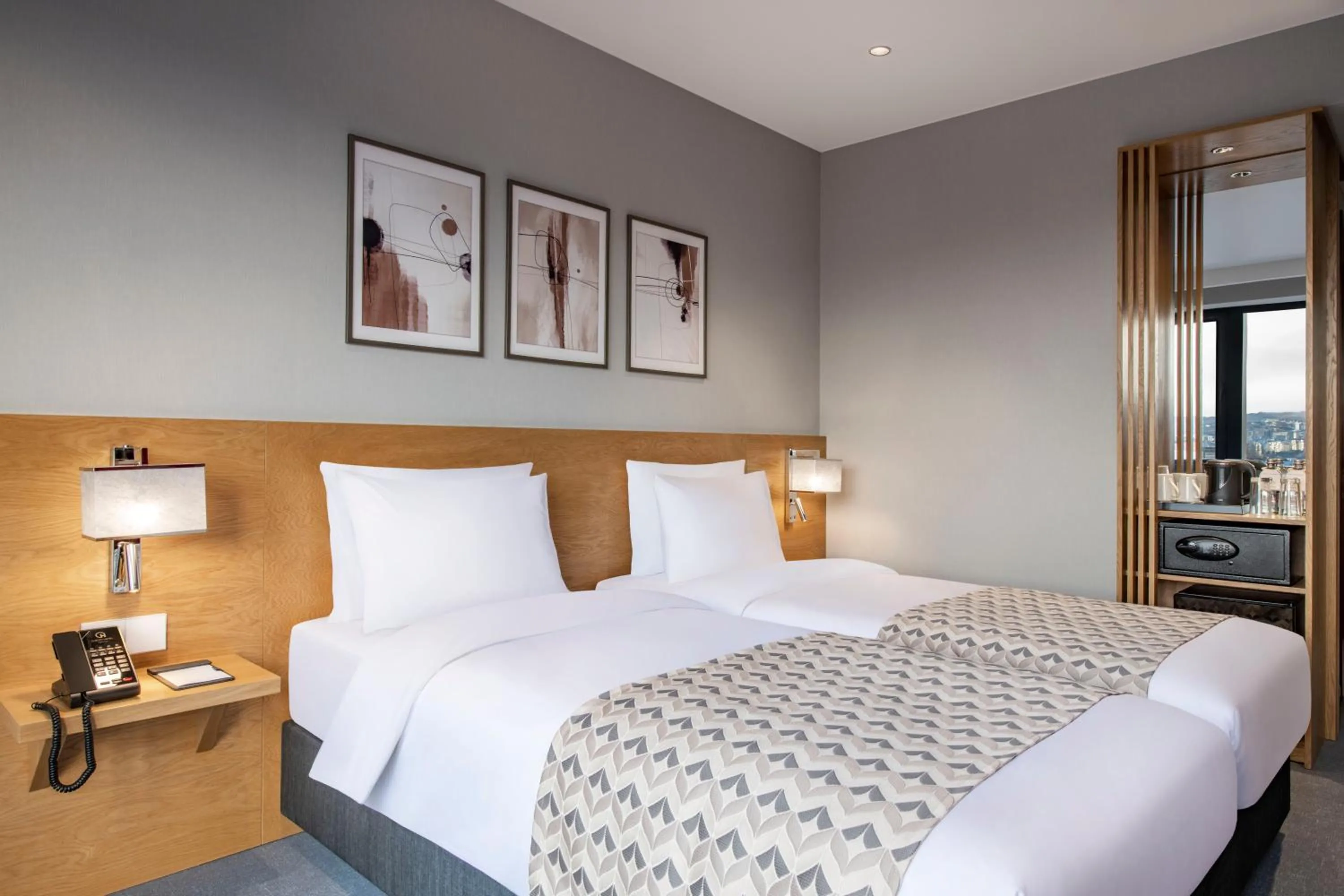 Bed in Clocks Hotel Tbilisi