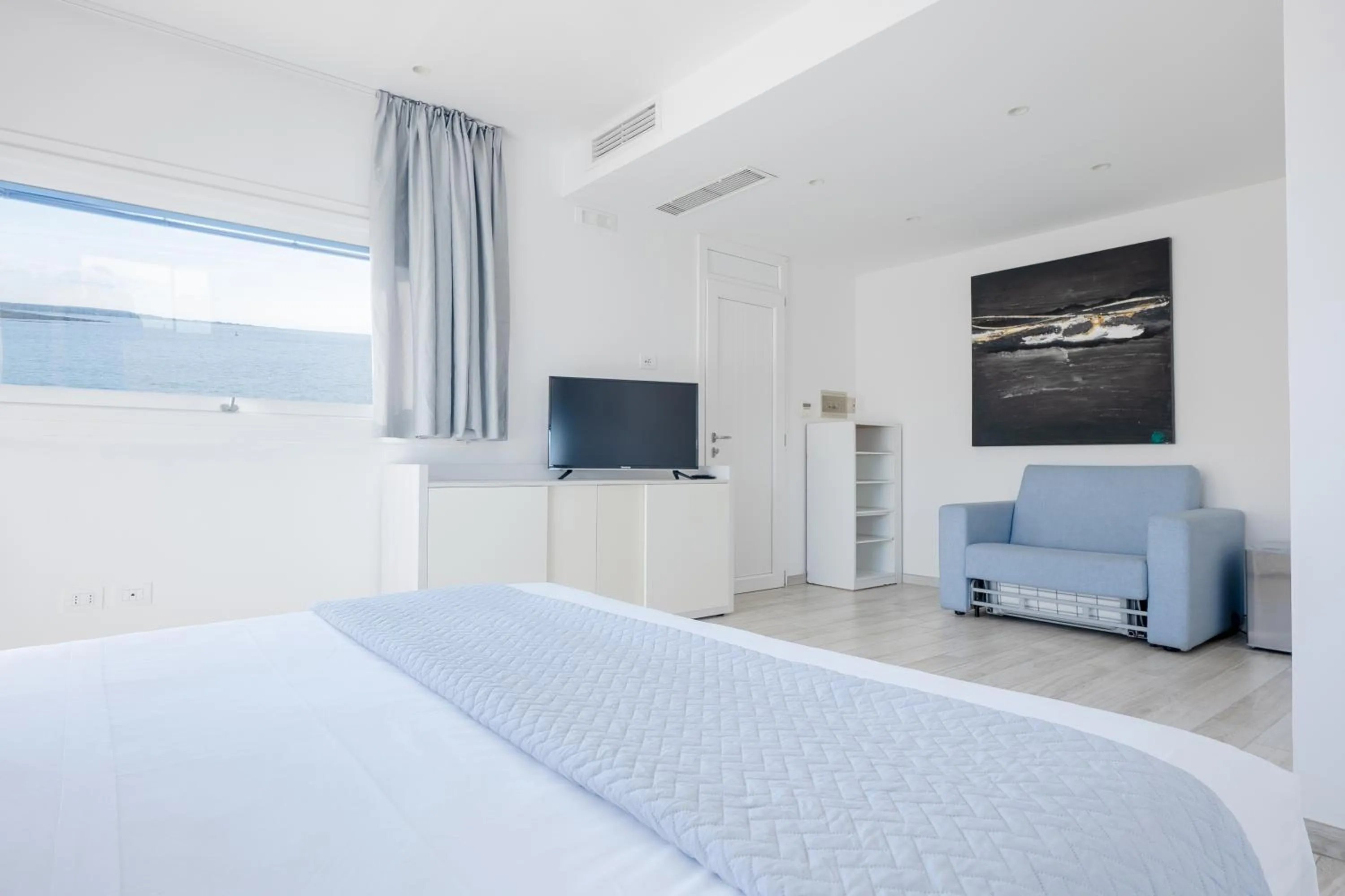 Bed in Hotel Lo Scoglio