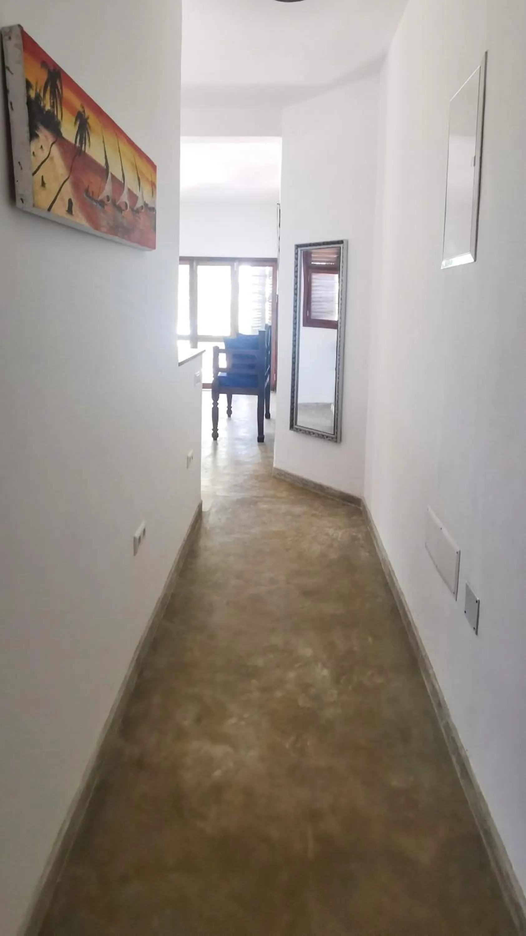 Communal lounge/ TV room in Villa Malaika