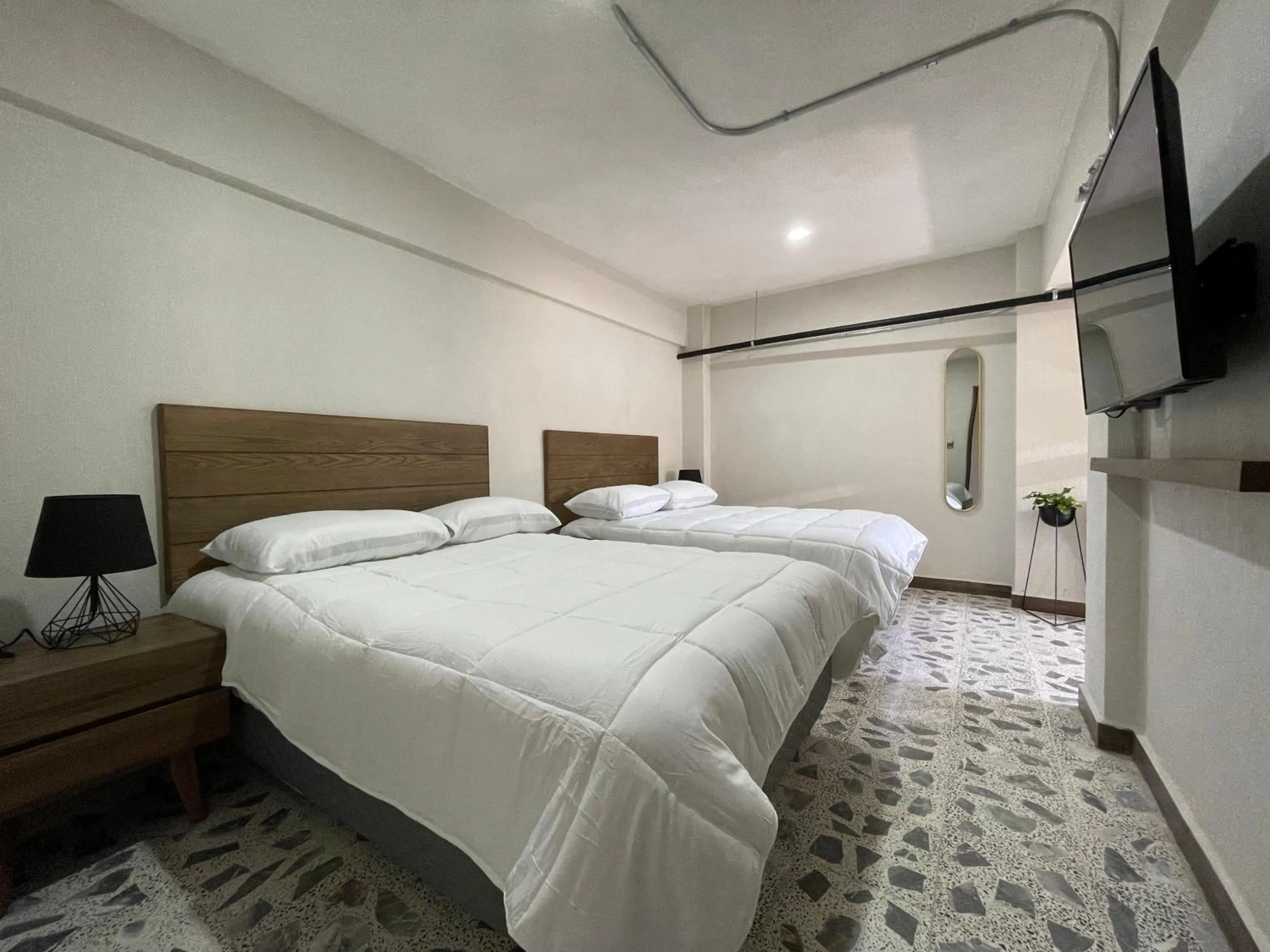 Photo of the whole room, Bed in Estacion Alameda Downtown