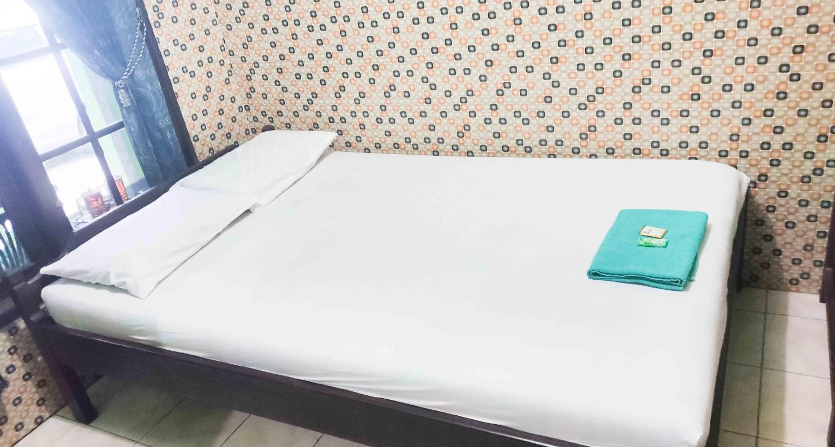 Bedroom, Bed in Bayu Murti Inn Kaliurang Yogyakarta RedPartner