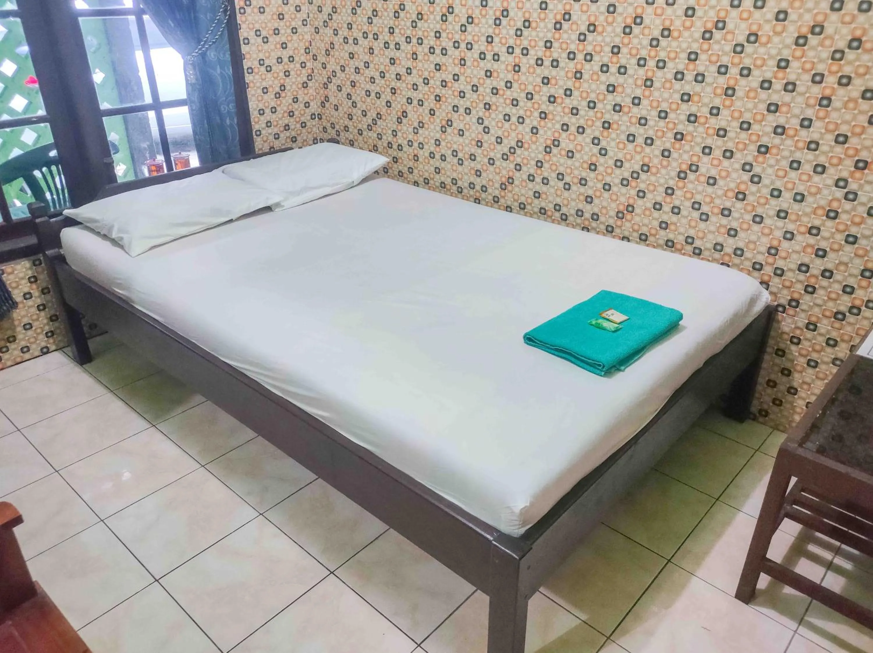 Bedroom, Bed in Bayu Murti Inn Kaliurang Yogyakarta RedPartner