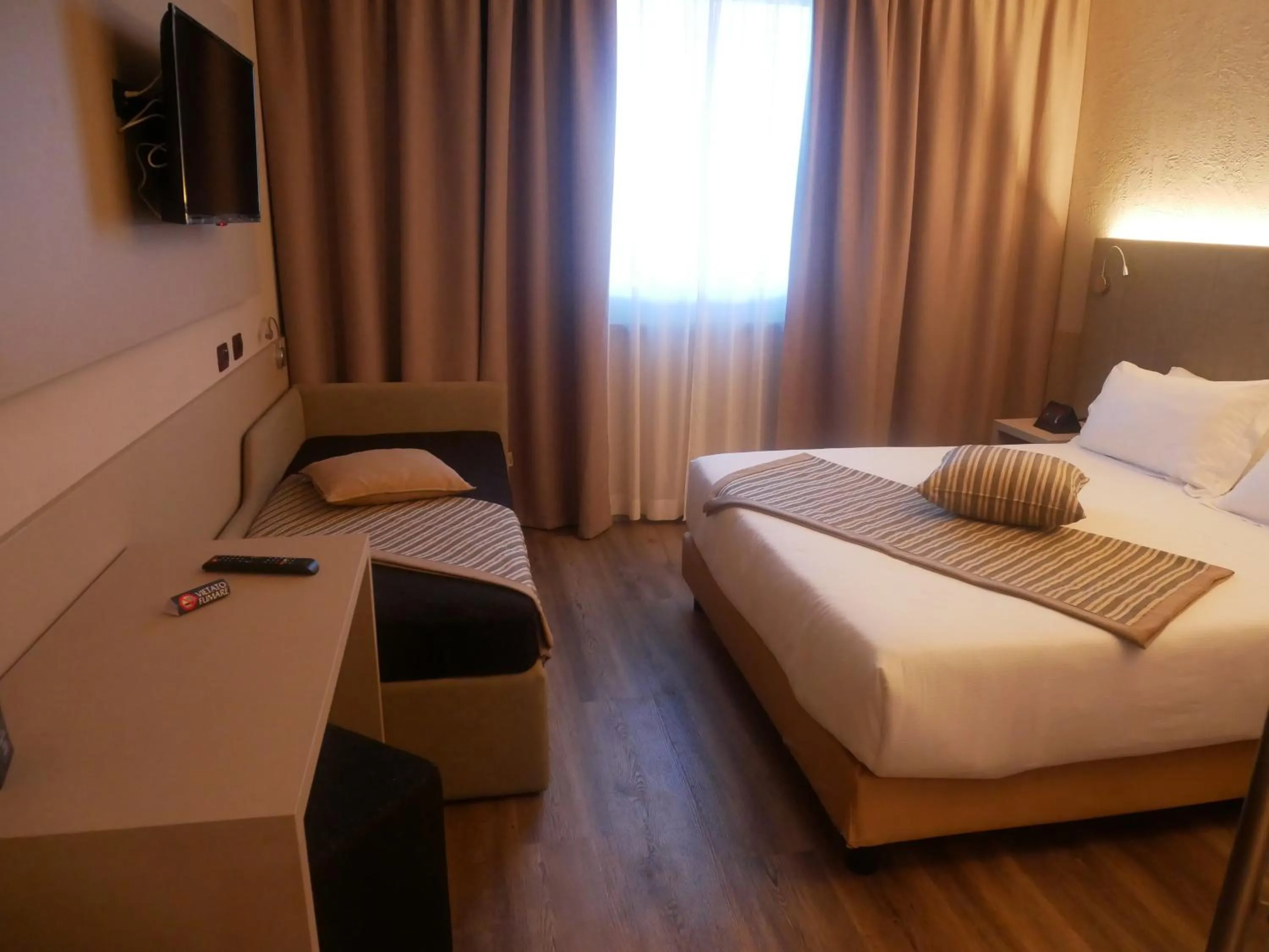 Bed in First Hotel Malpensa